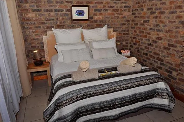 Bed in Tranquillity Day Spa & Lodge