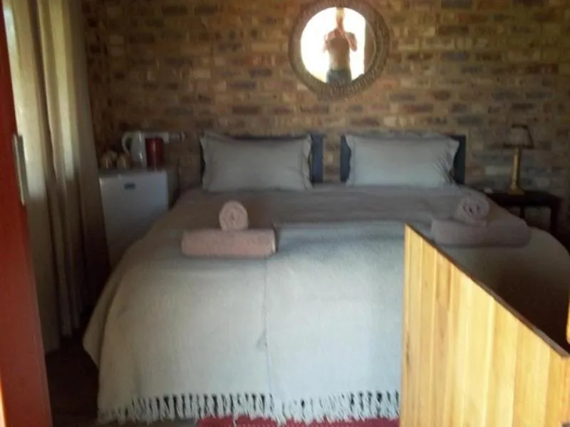Bed in Tranquillity Day Spa & Lodge