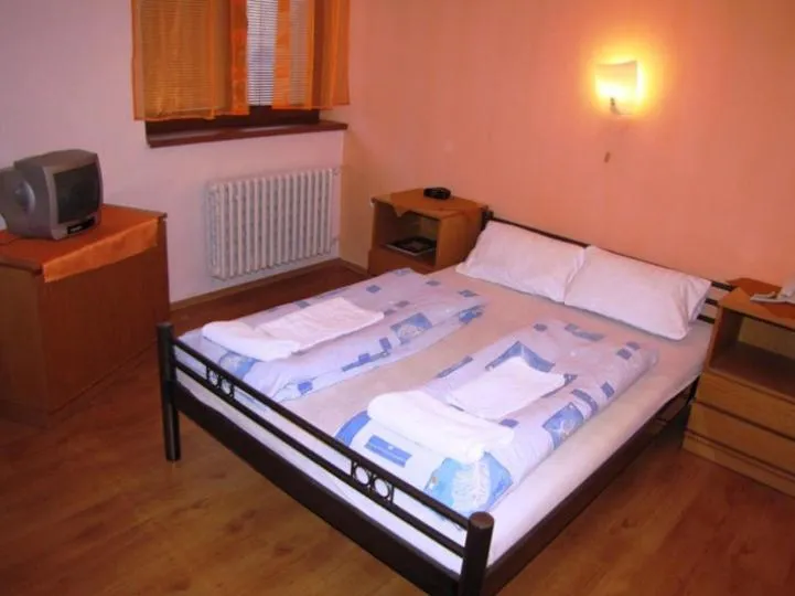 Bed in Hotel Slovan