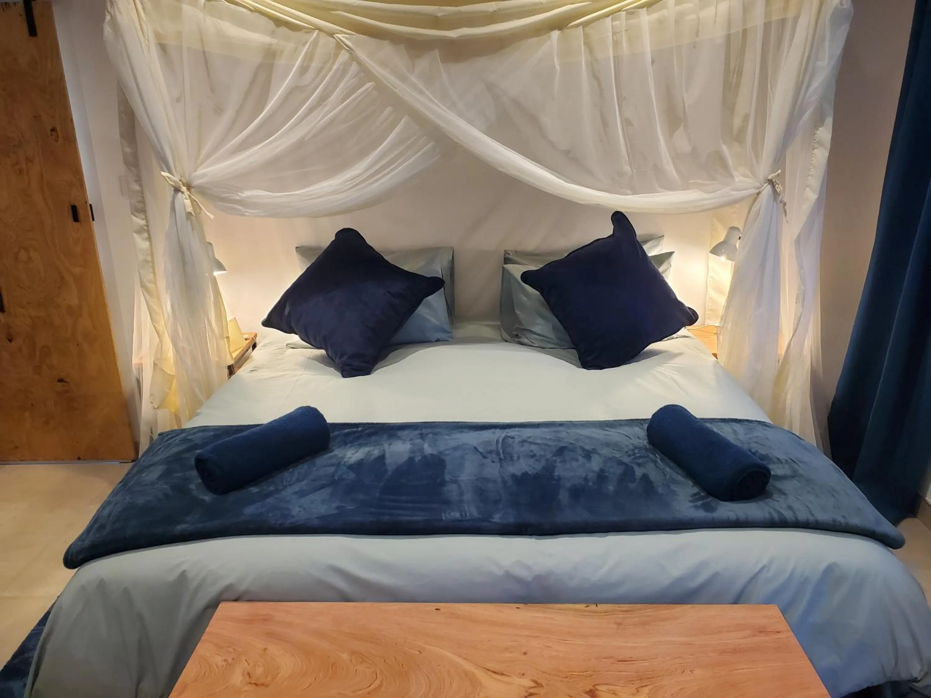 Bed in Fawlty Towers Accommodation & Activities