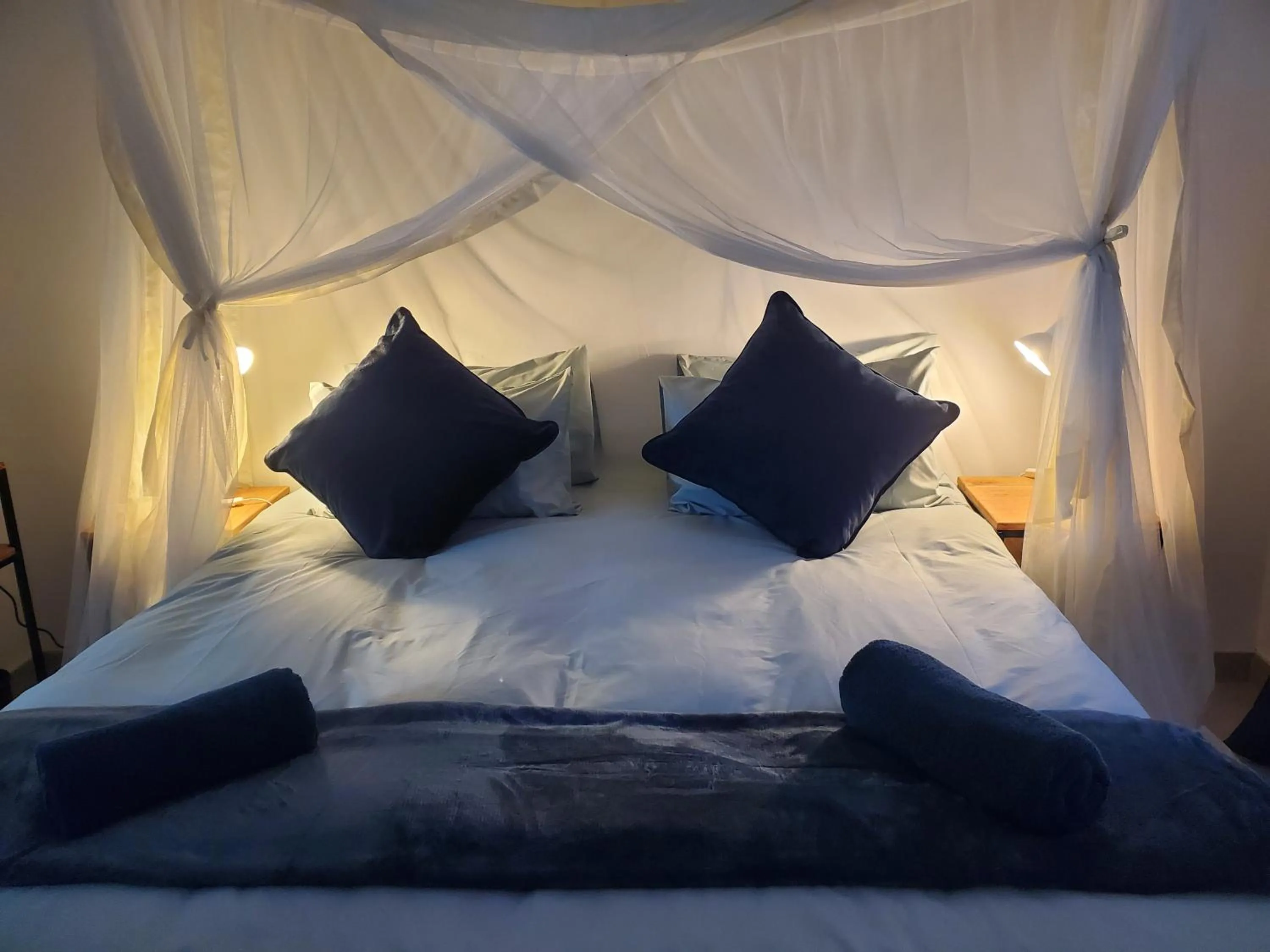 Bed in Fawlty Towers Accommodation & Activities