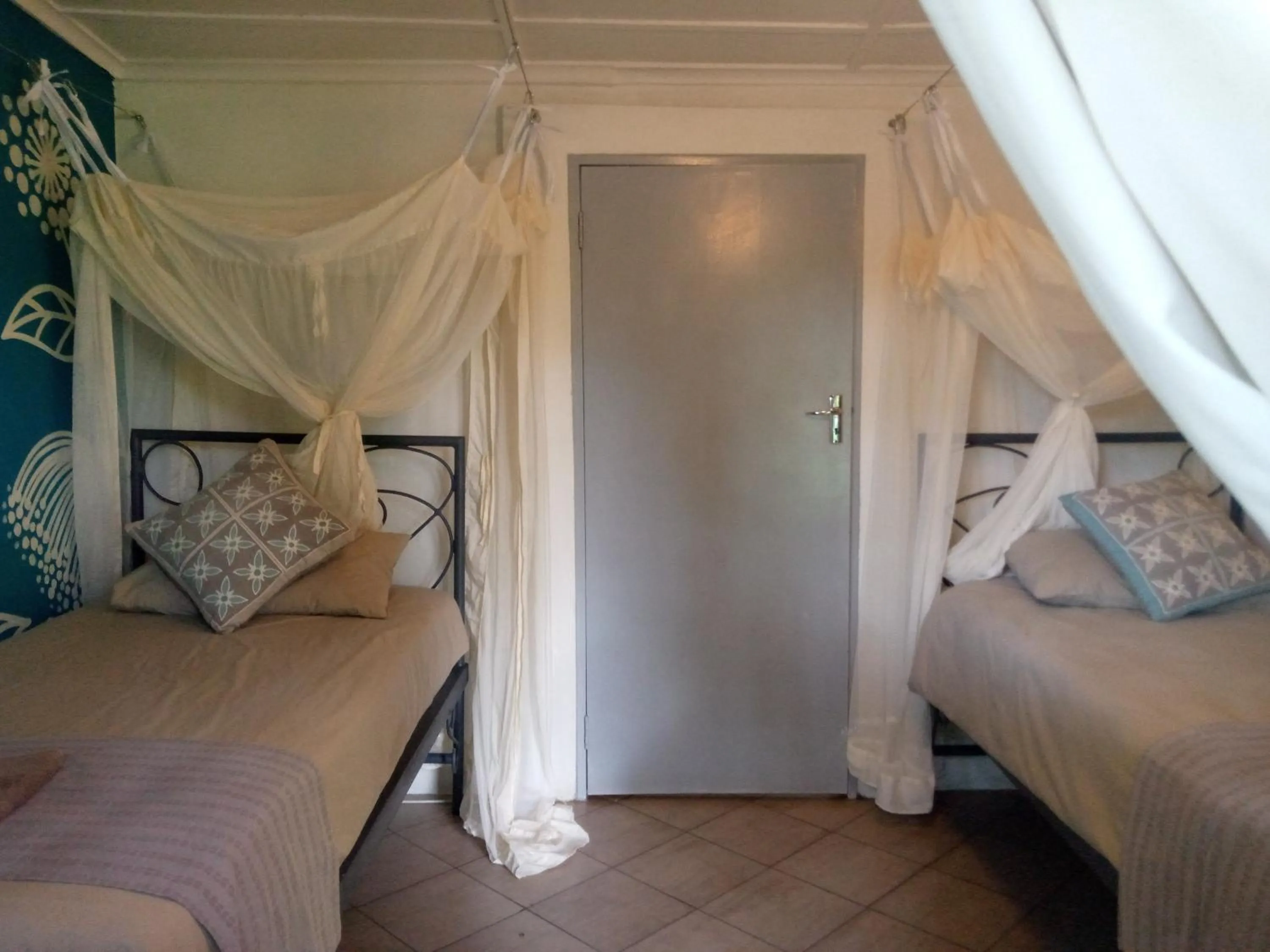 Bed in Fawlty Towers Accommodation & Activities