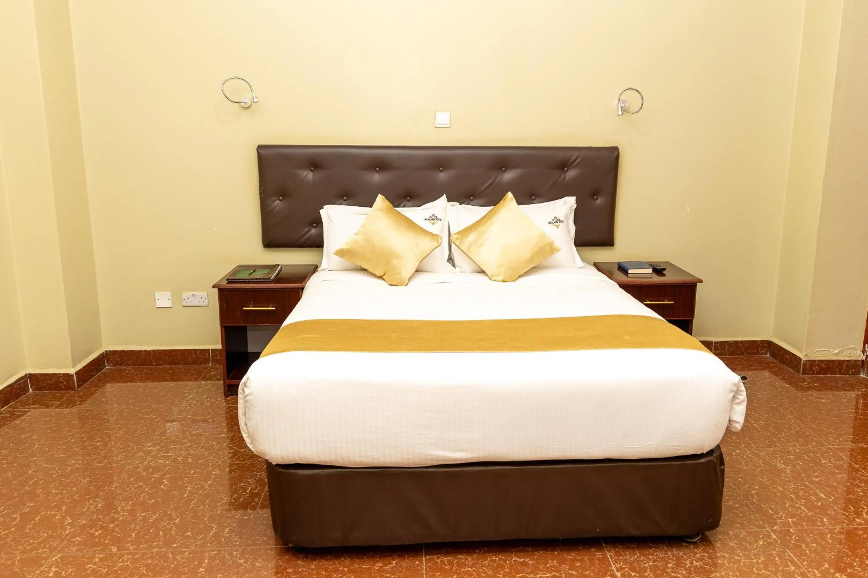 Bed in Maxland Hotel