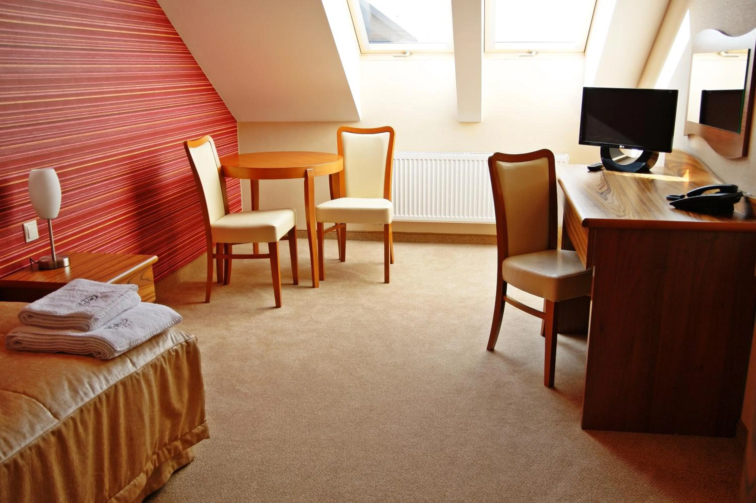 Photo of the whole room in Hotel Fajkier