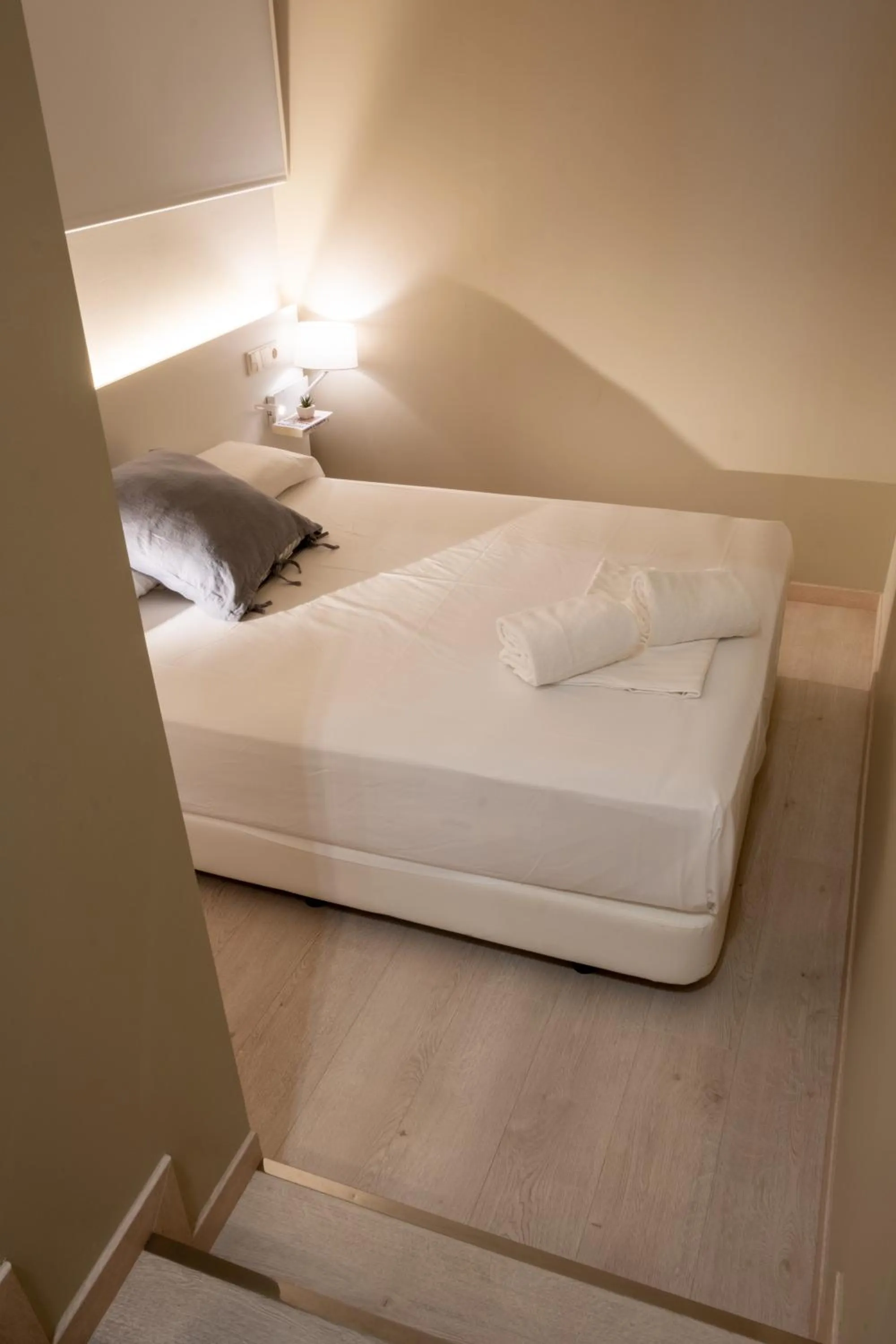 Bed in Daro Apartments