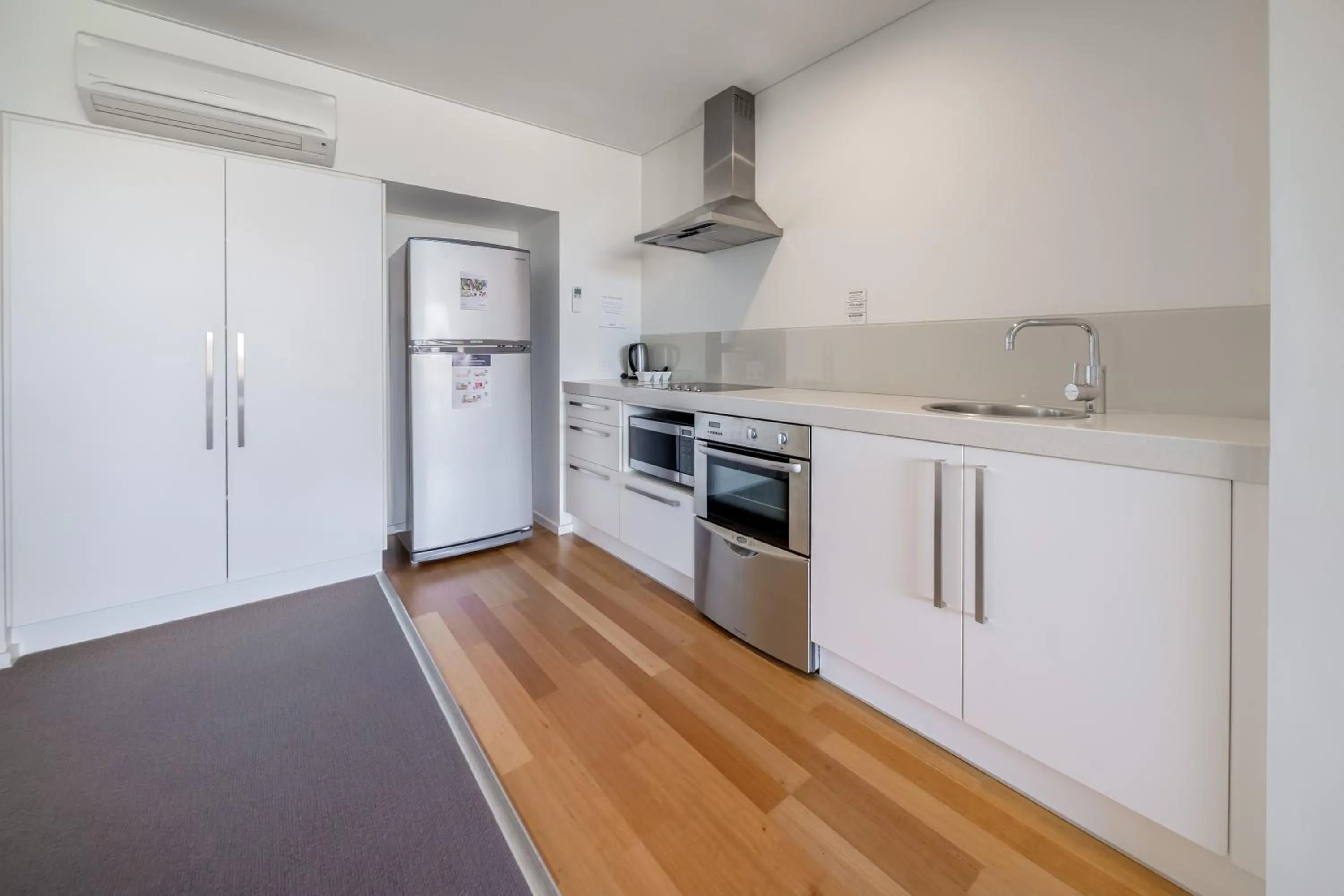 Kitchen or kitchenette in Oaks Nelson Bay Lure Suites