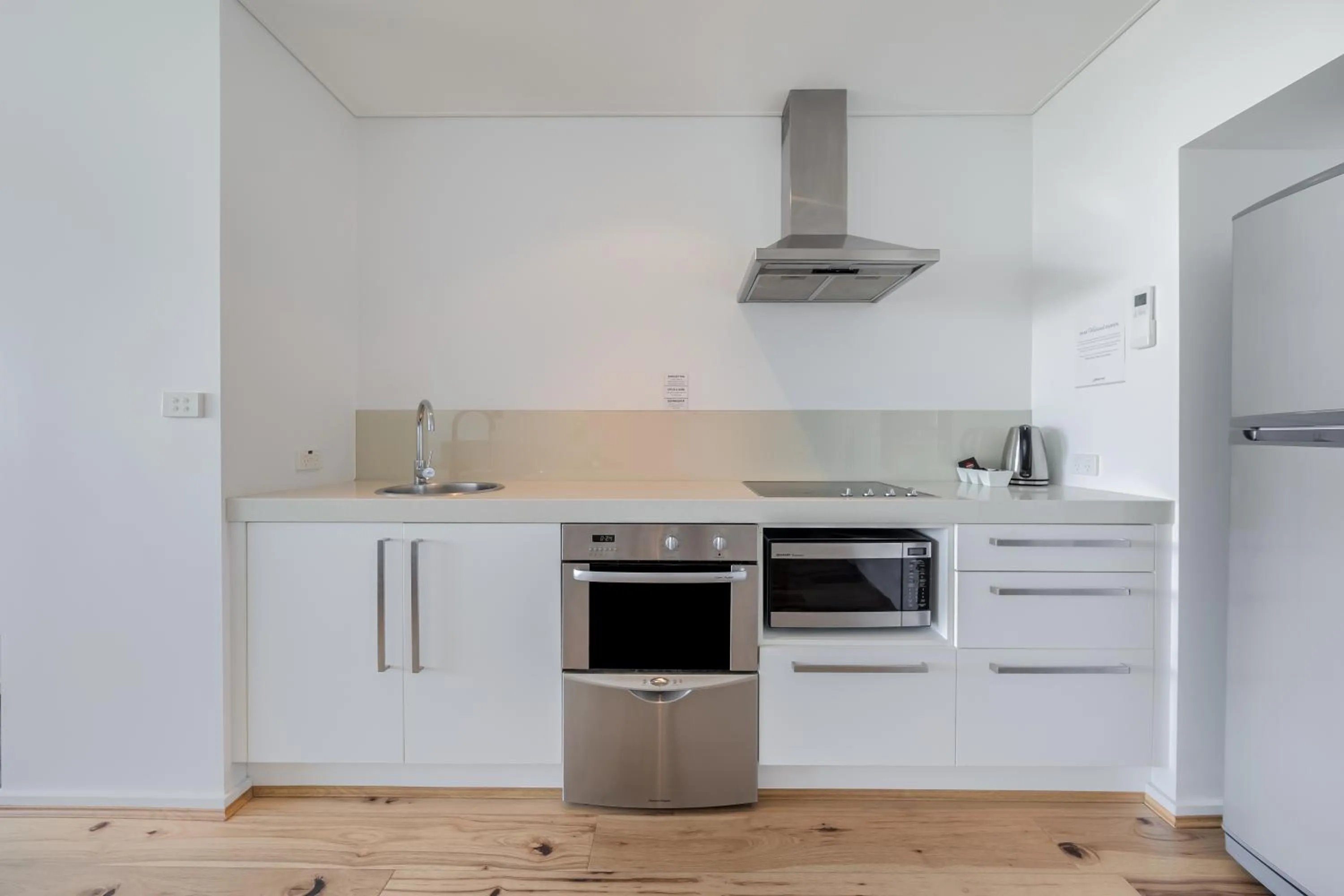 Kitchen or kitchenette in Oaks Nelson Bay Lure Suites