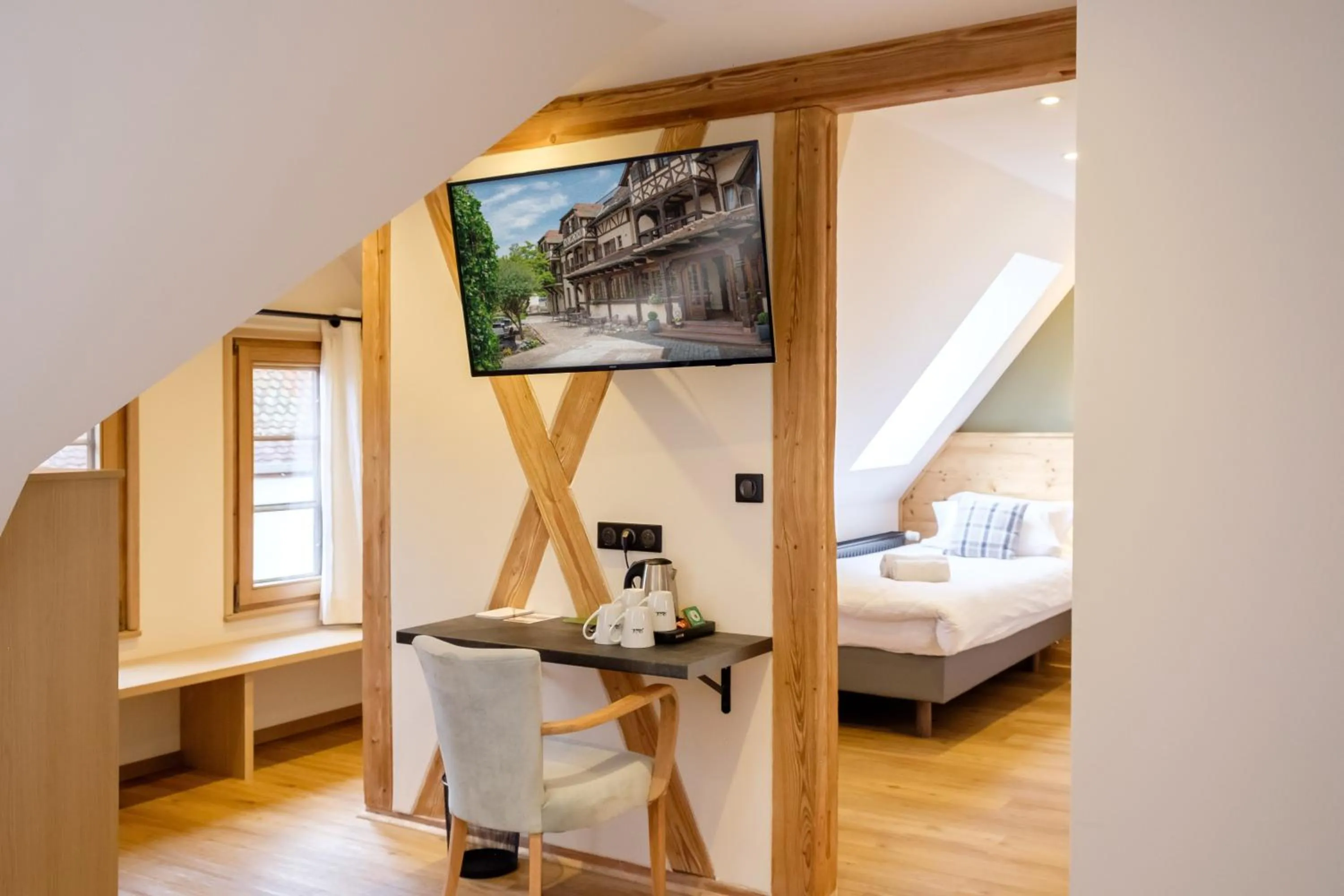 Seating area, Bed in Hôtel au Heimbach