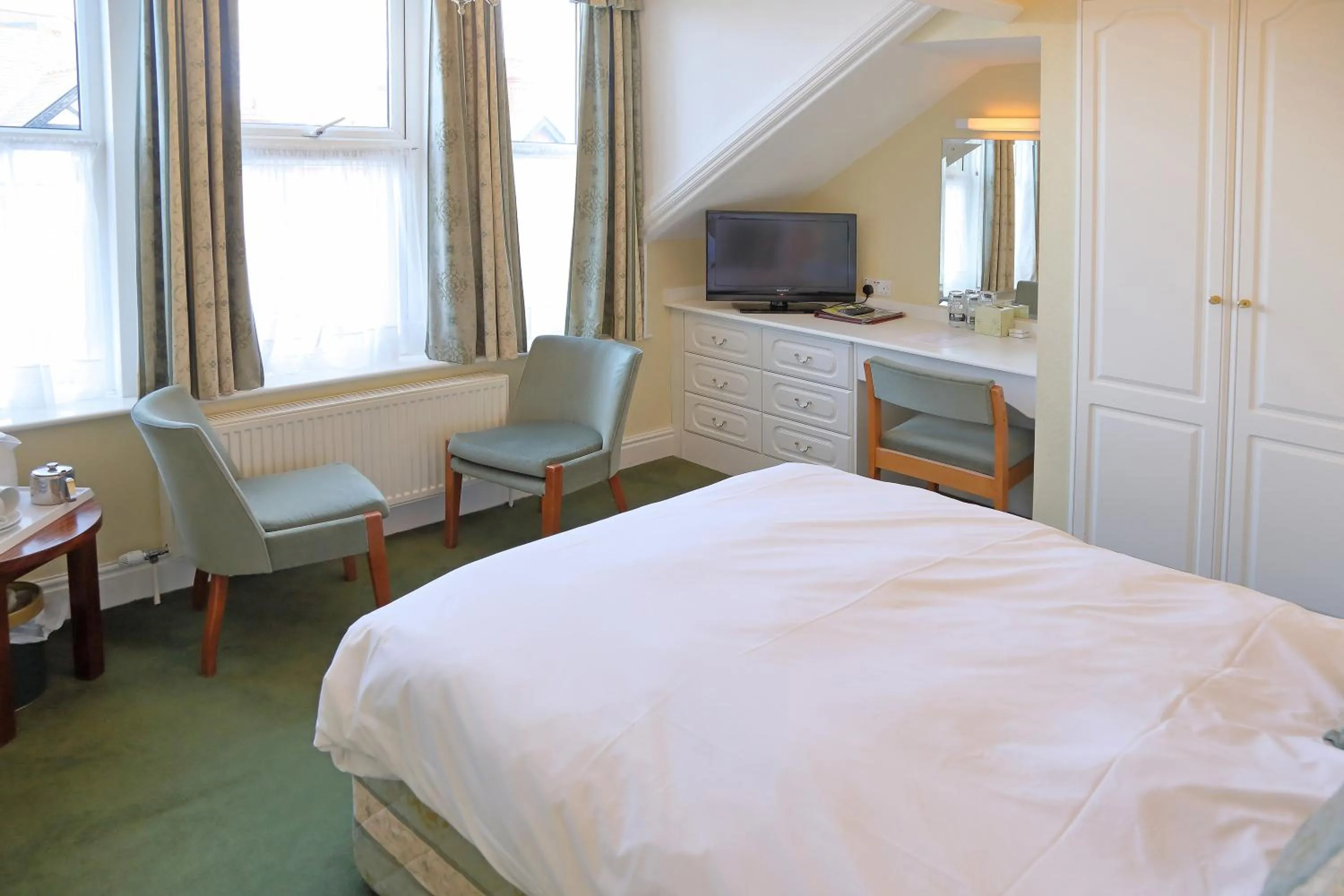 Bed in Saxonville Hotel