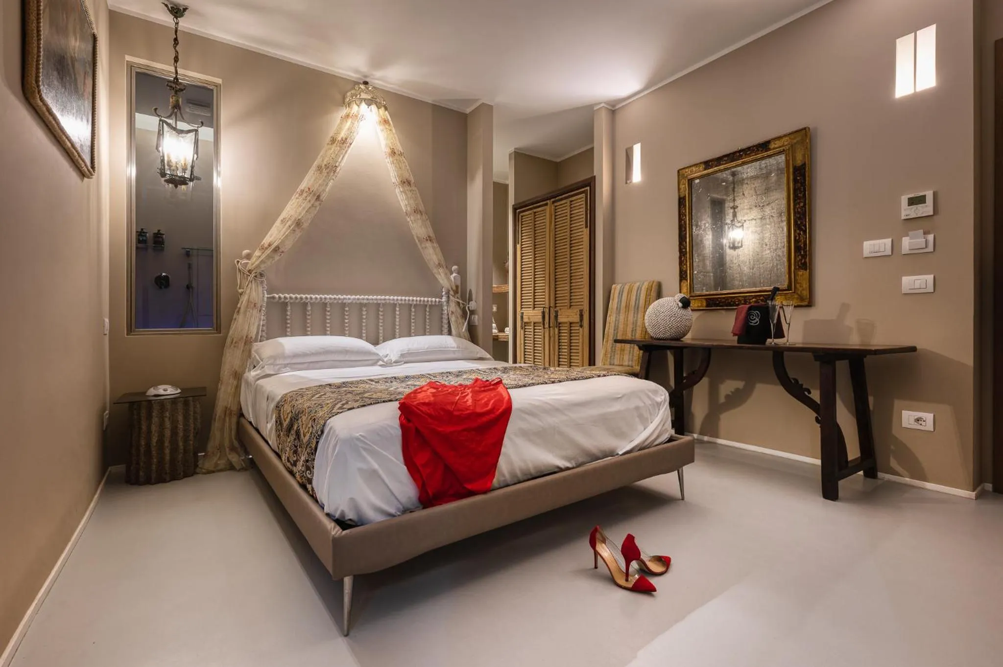 Bed in A'Mare Luxury Rooms