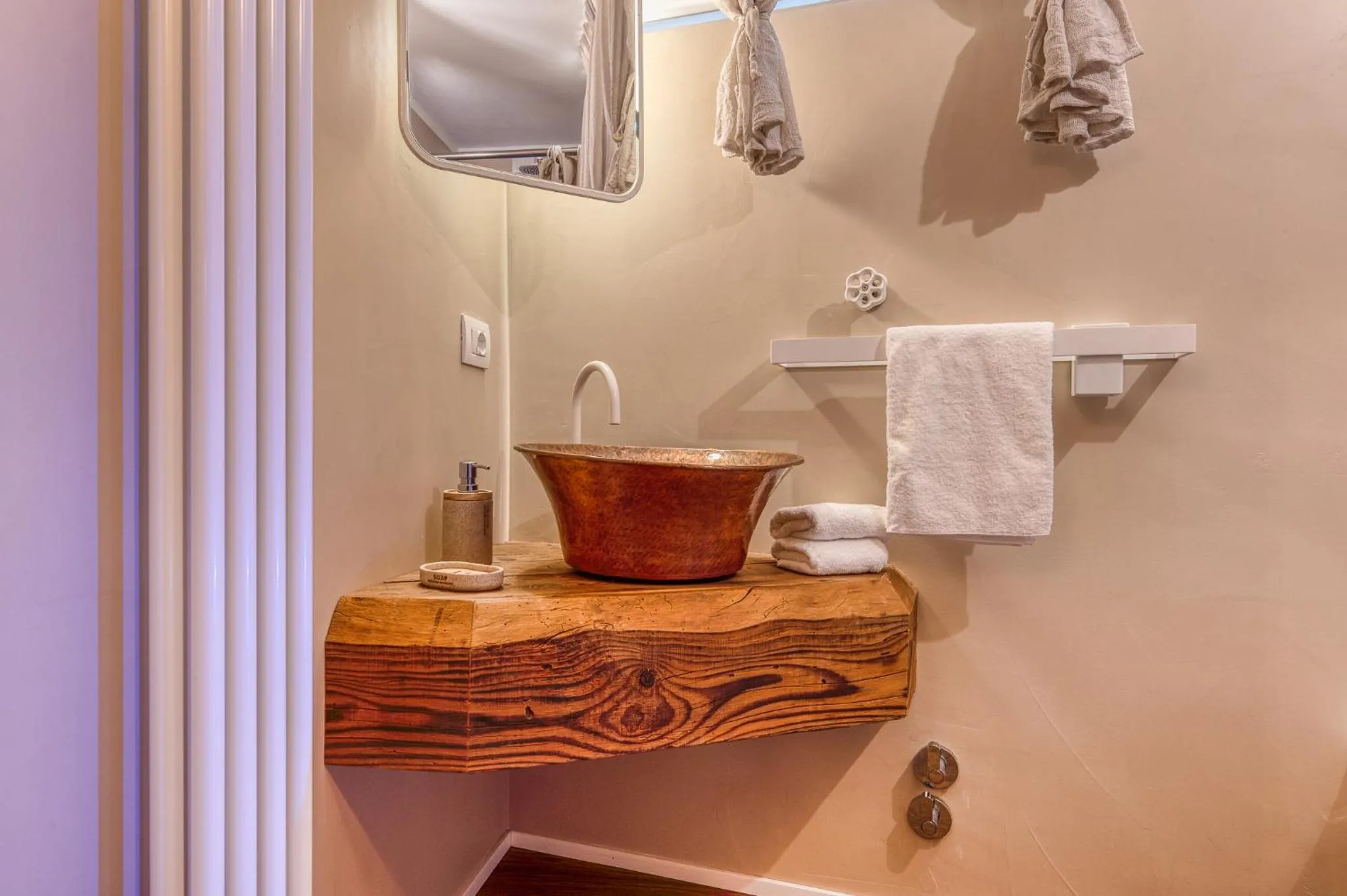 Bathroom in A'Mare Luxury Rooms