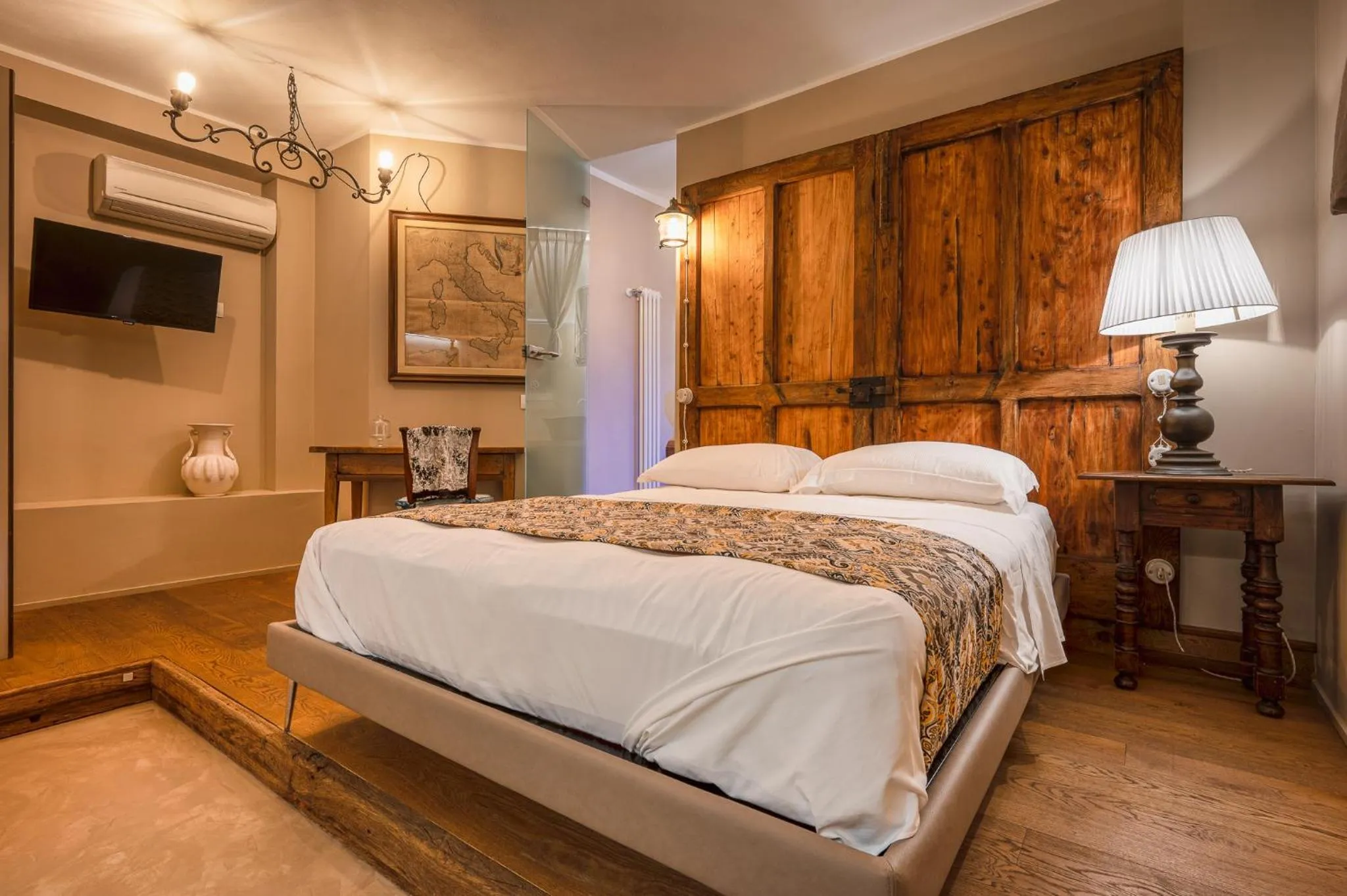 Bed in A'Mare Luxury Rooms