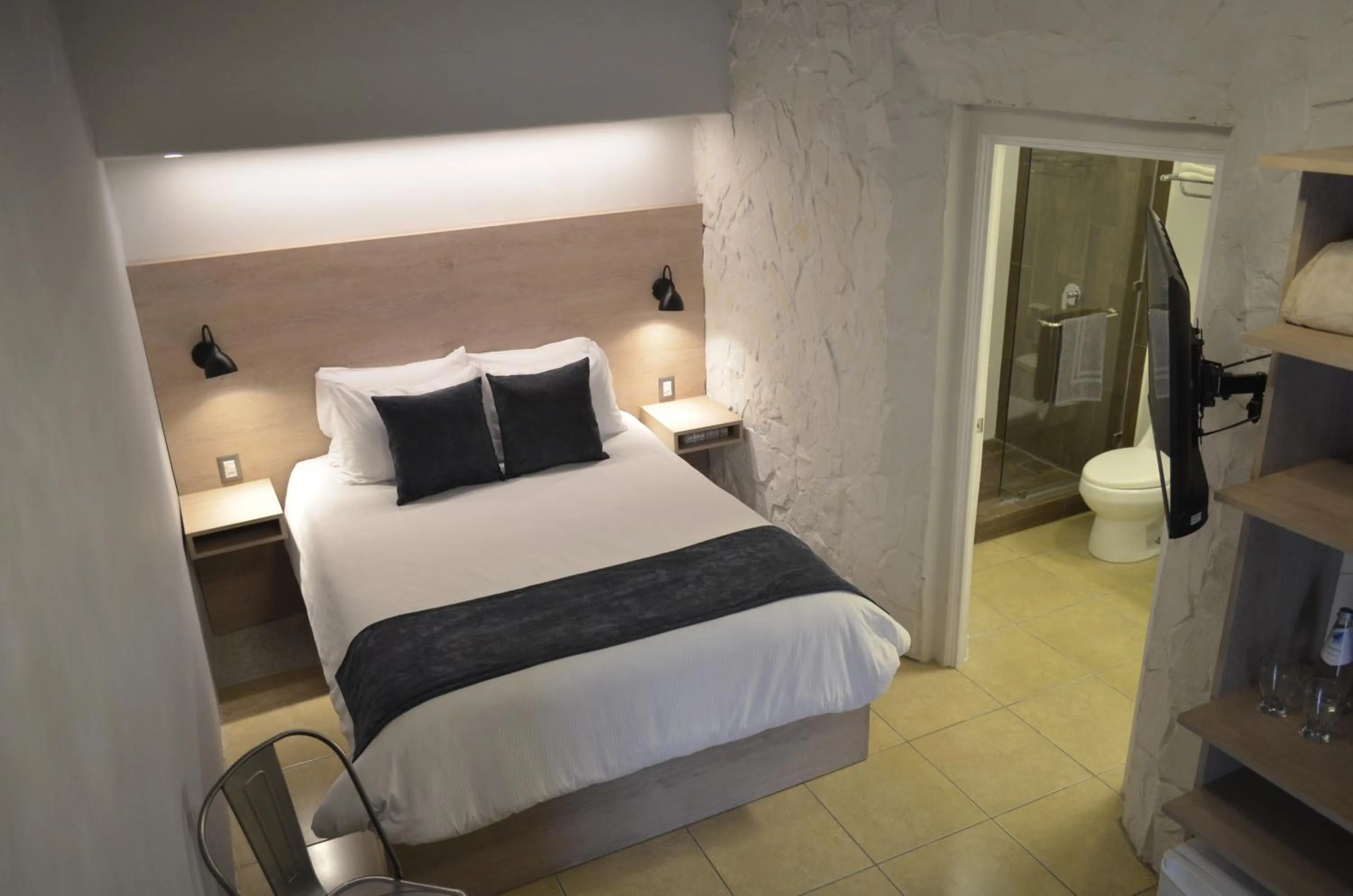 Bed in Casa Bella Boutique Hotel