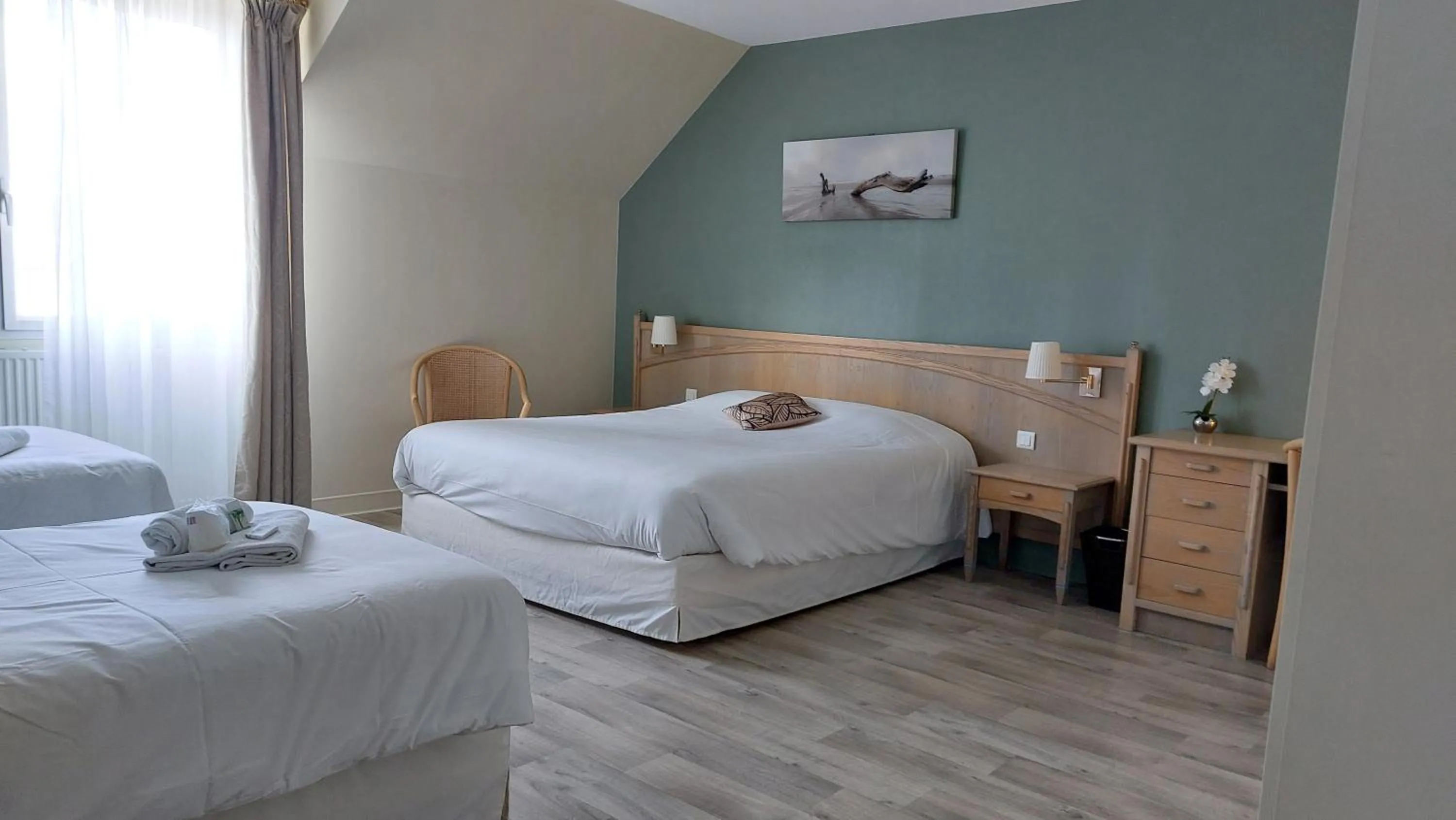 Bed in Hotel Beau Rivage