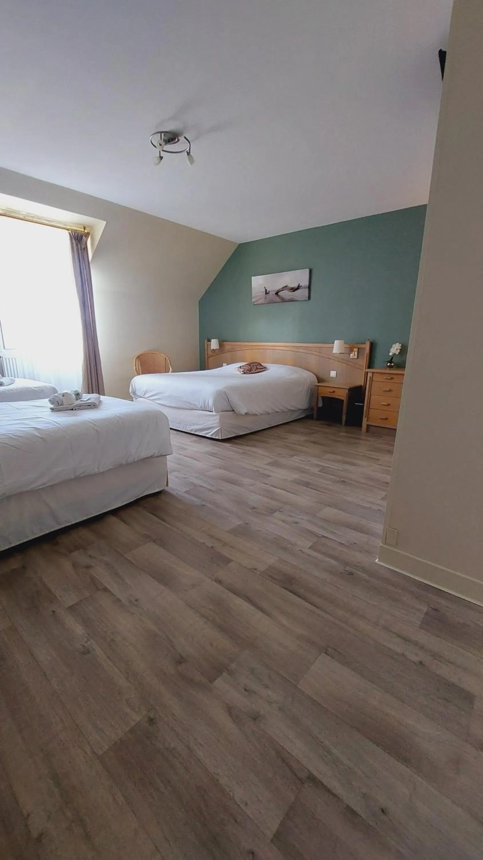 Bed in Hotel Beau Rivage