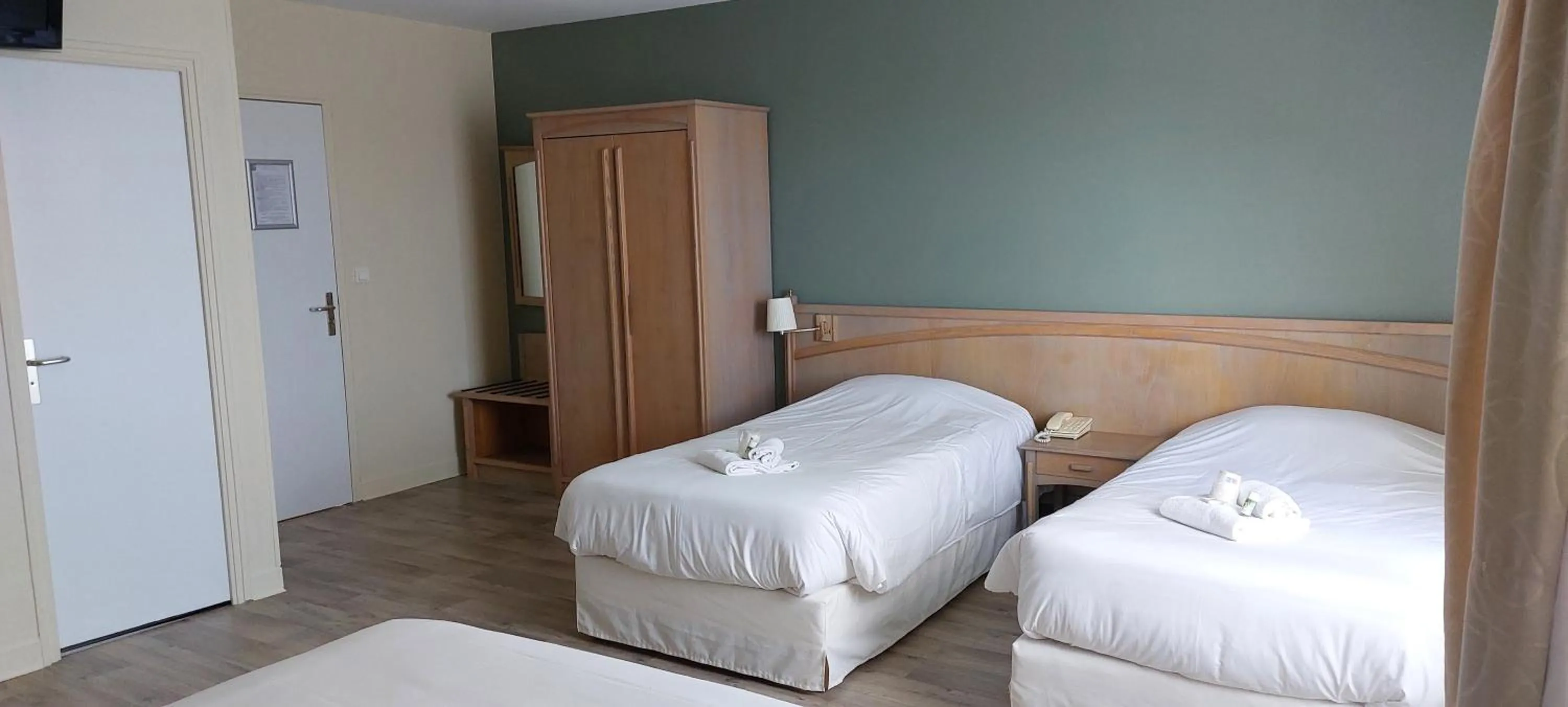 Bed in Hotel Beau Rivage