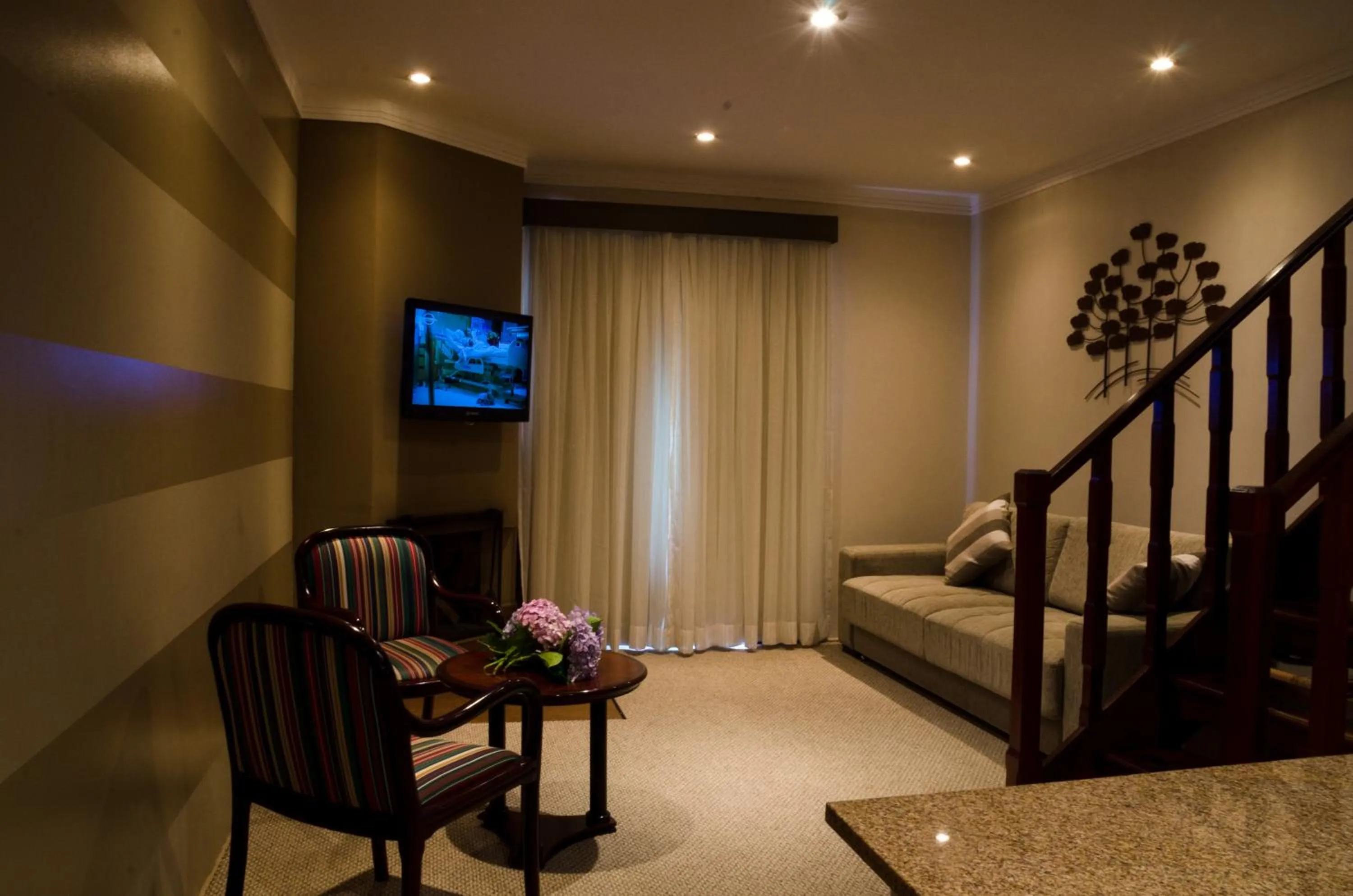 Seating area in Hotel Home Green Home