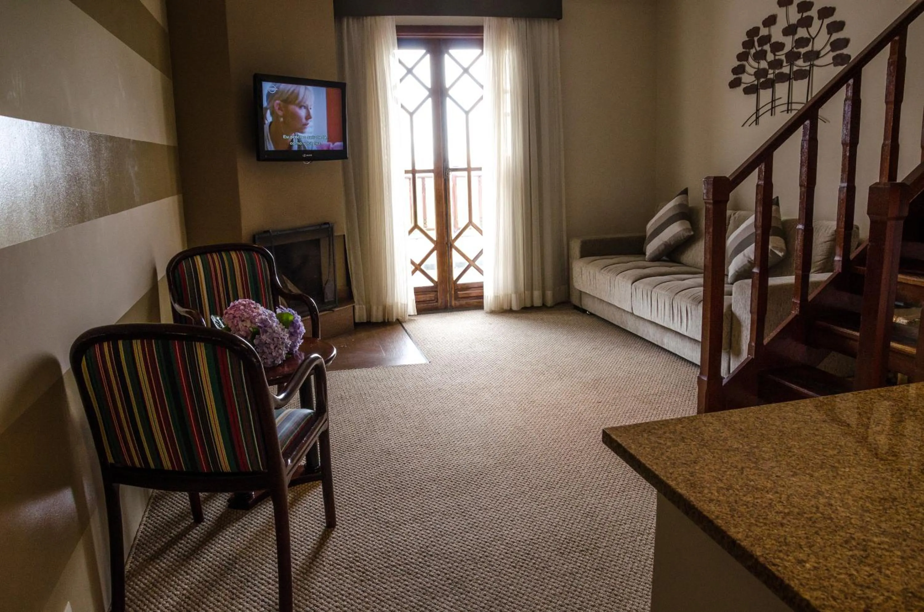 Seating area in Hotel Home Green Home