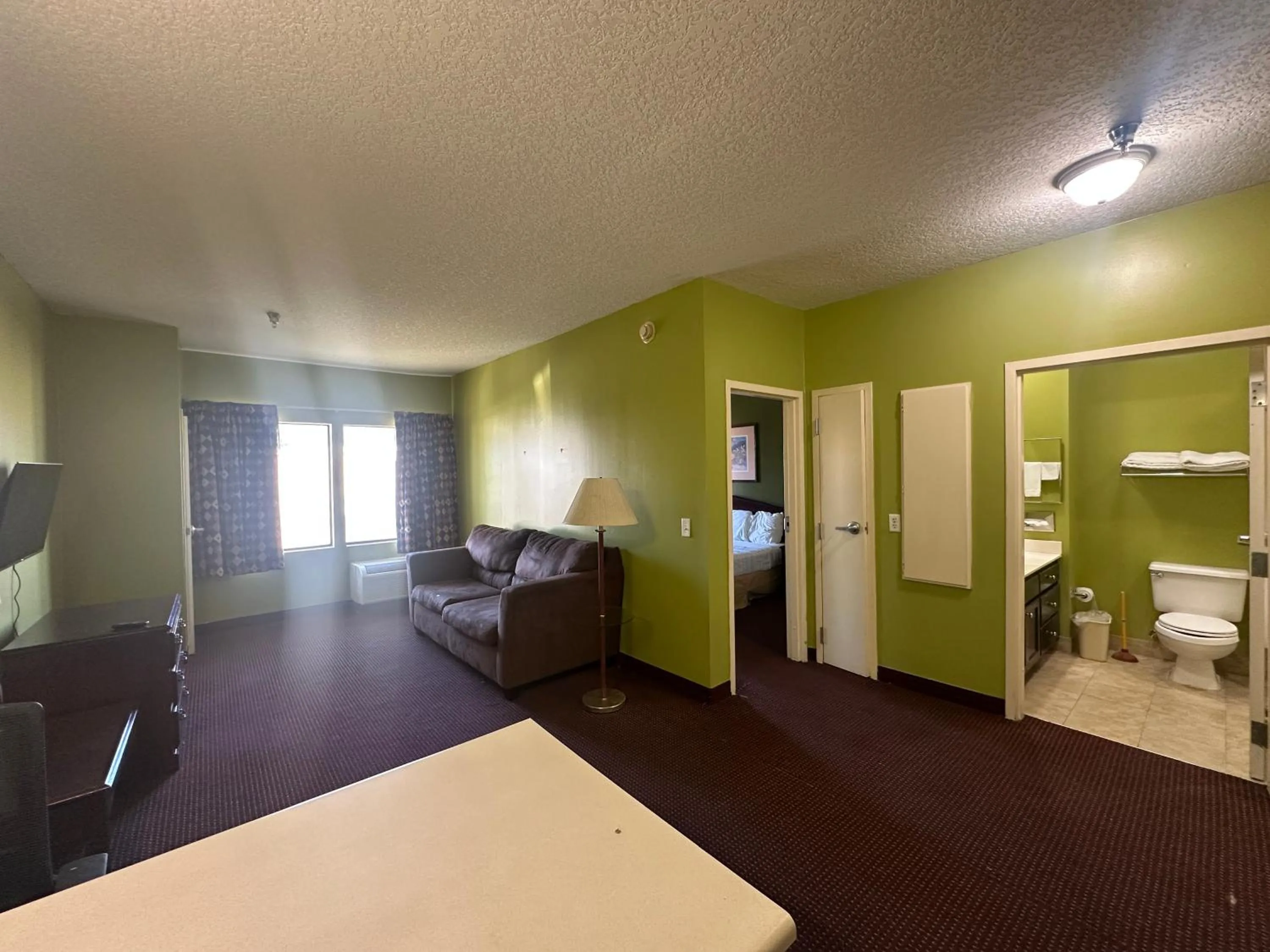 Bedroom in Guest Cottage & Suites By OYO Brunswick-Golden Isles