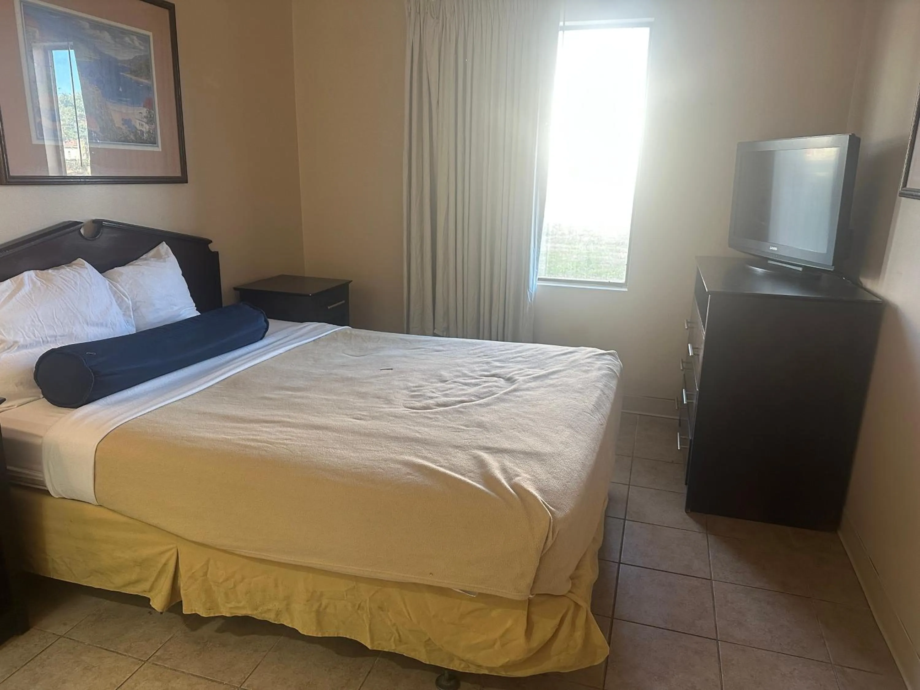 Bedroom in Guest Cottage & Suites By OYO Brunswick-Golden Isles