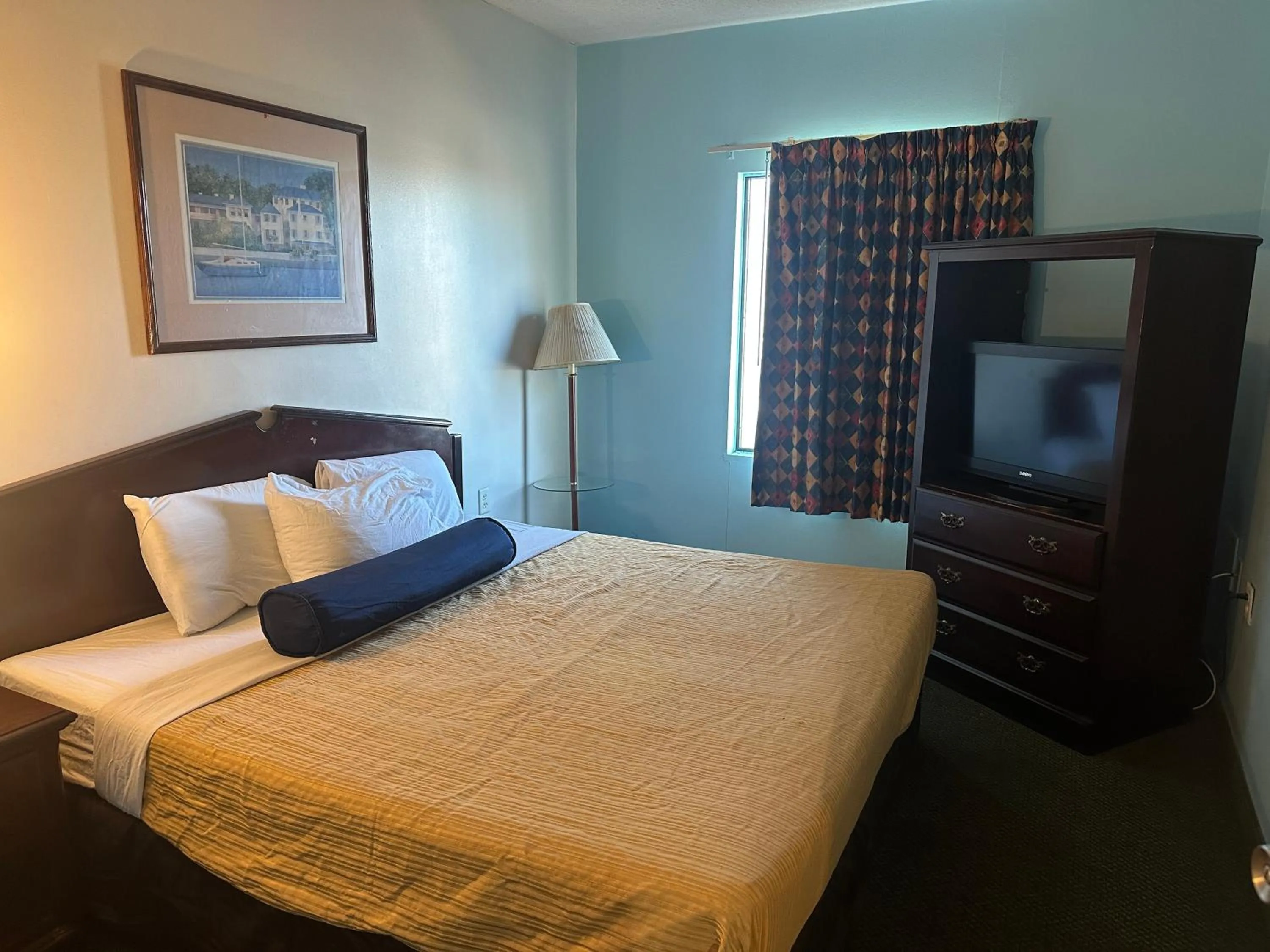 Bedroom in Guest Cottage & Suites By OYO Brunswick-Golden Isles