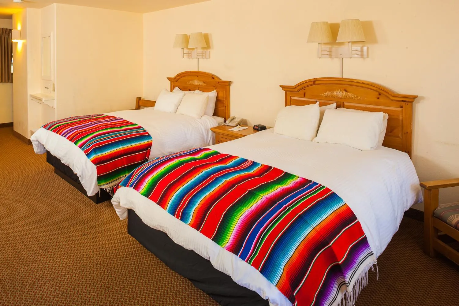 Bed in El Pueblo Lodge
