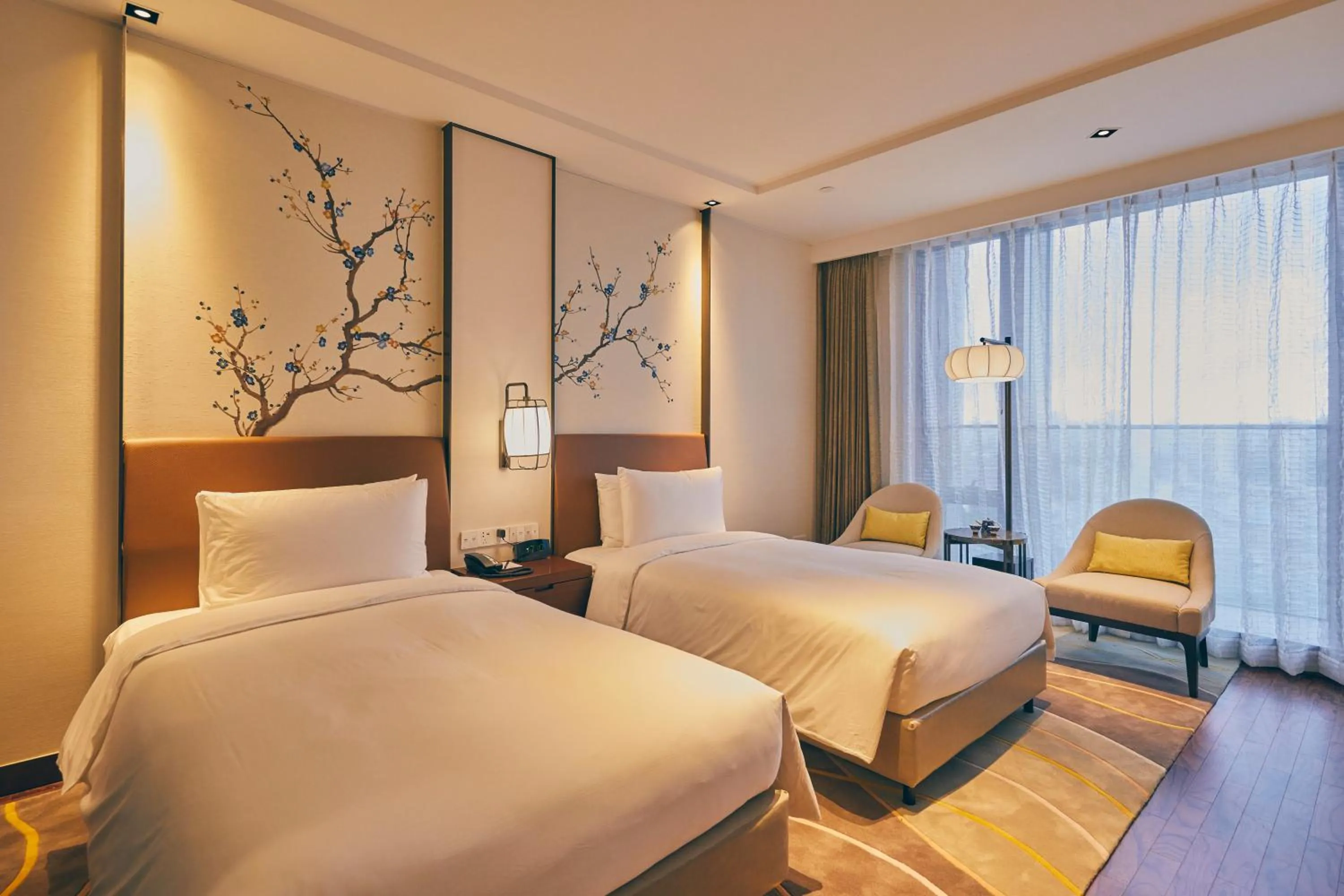 Bed in LJZ Supreme Tower Hotel