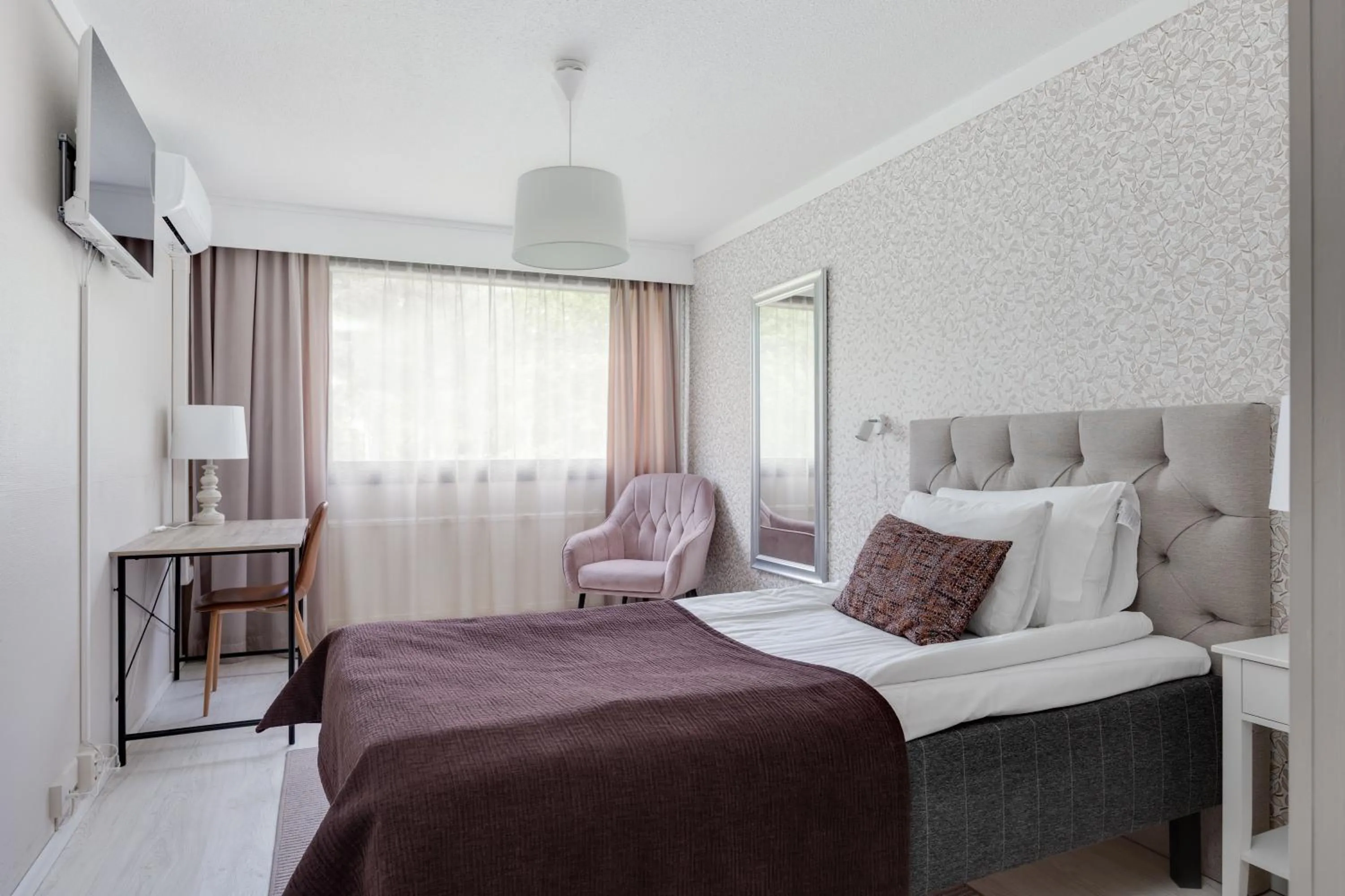 Bed in Hotel Käenpesä