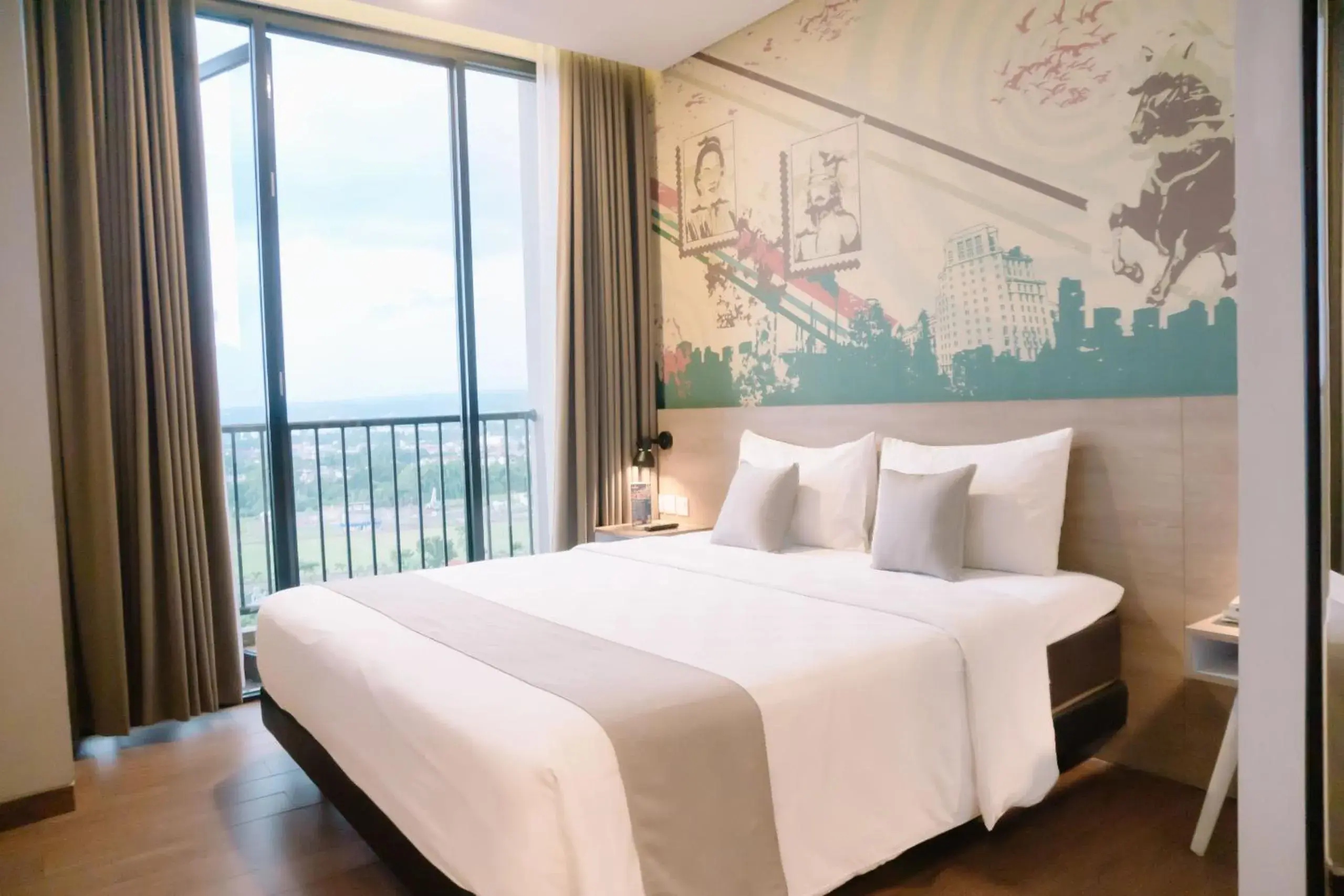 Double Room with Balcony in Hotel Fortunagrande Jember By Fosia Hotels Double Room with Balcony in Hotel Fortunagrande Jember By Fosia Hotels
