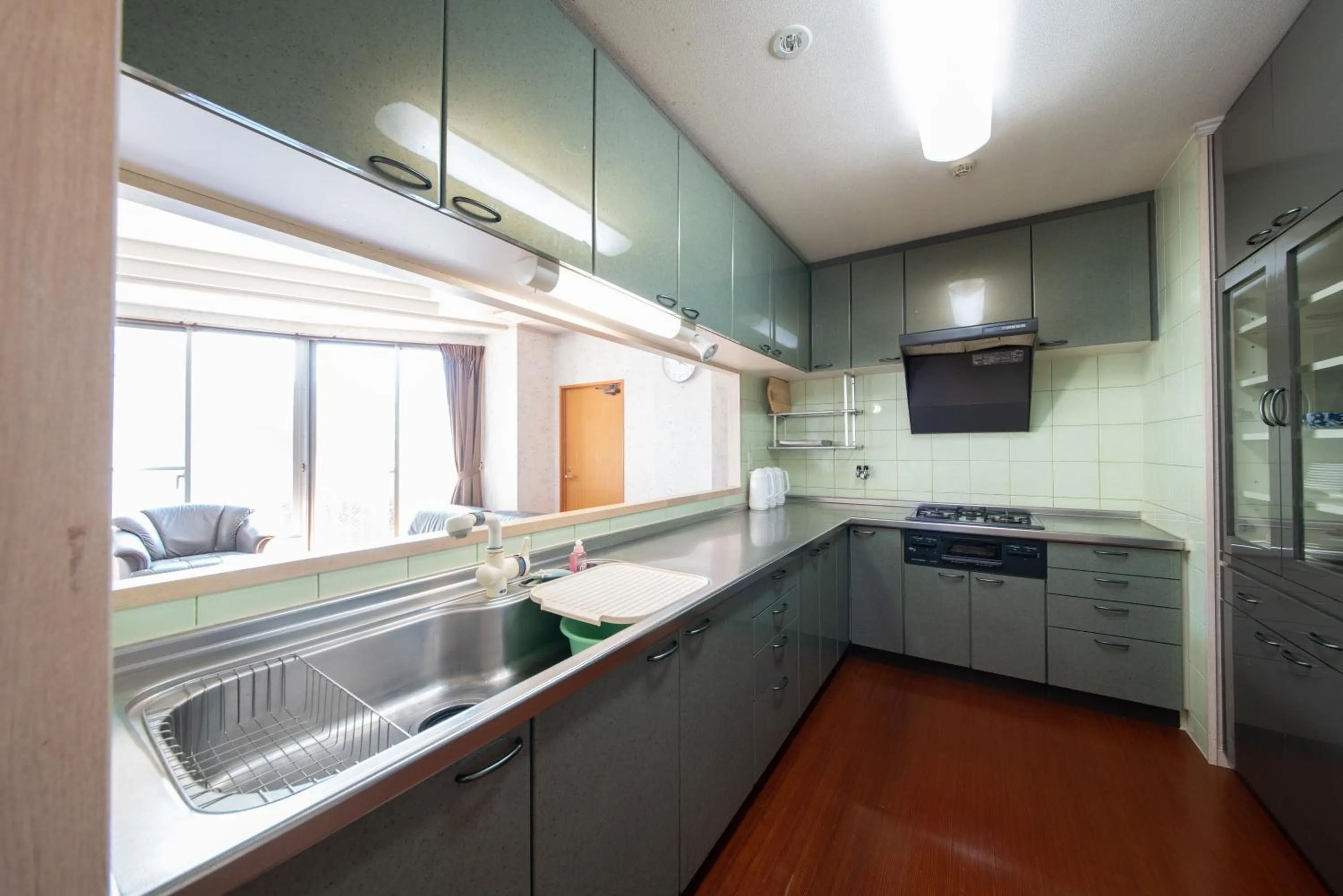 Kitchen or kitchenette in Asuka Hotel