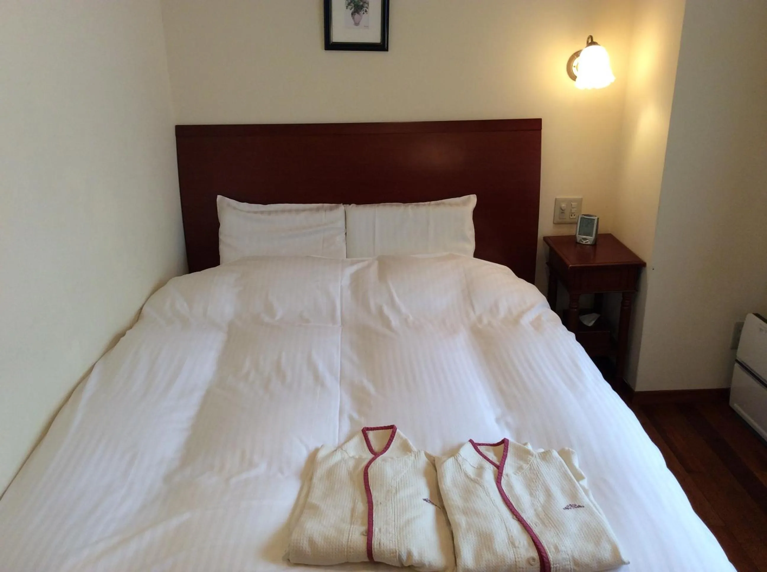 Bed in Hotel Sun Queen