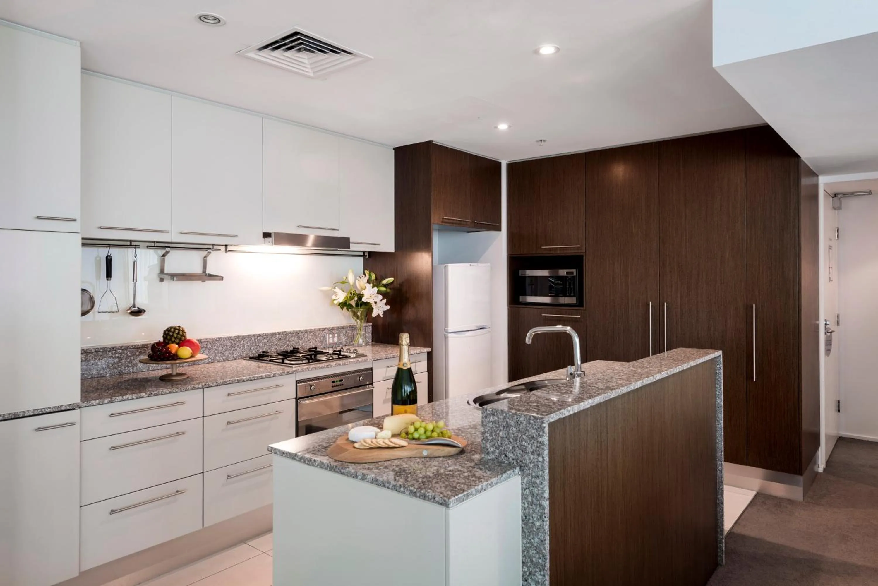 Kitchen or kitchenette in Oaks Brisbane Aurora Suites