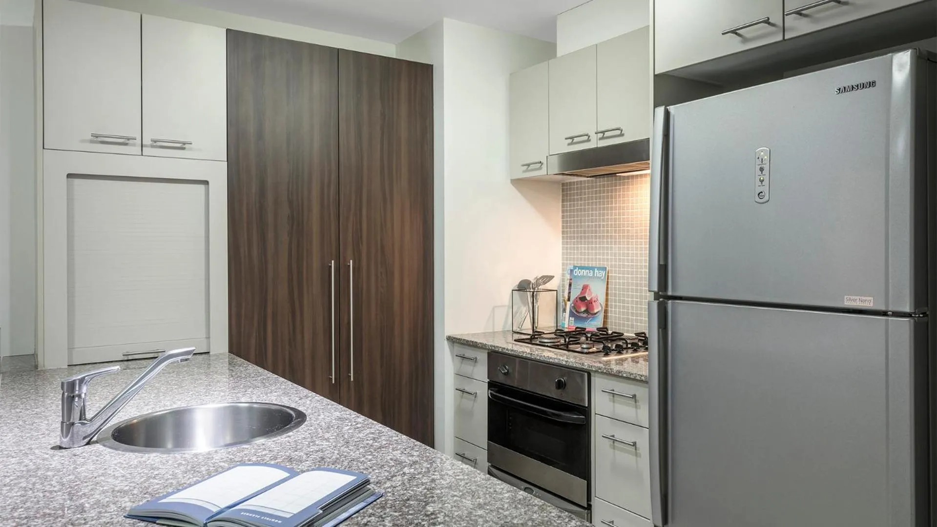 Kitchen or kitchenette in Oaks Brisbane Aurora Suites
