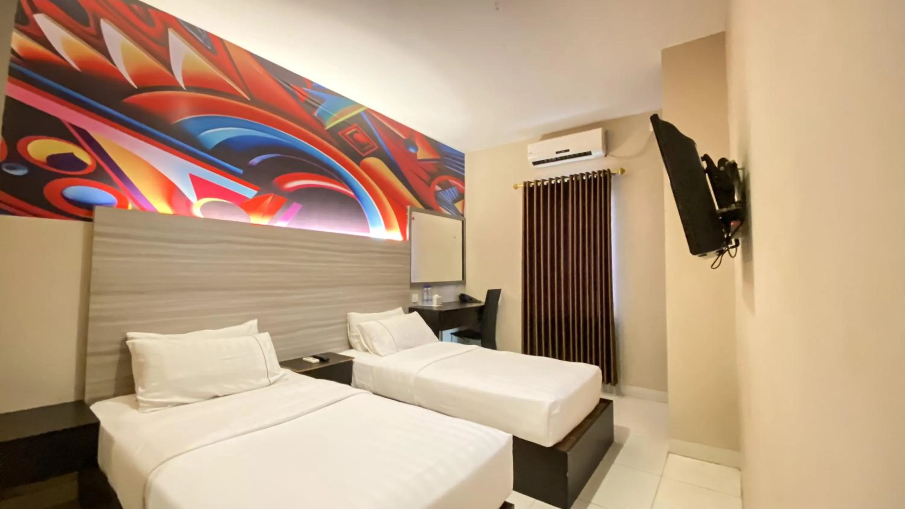 Bed in OS Hotel Batu Aji Batam