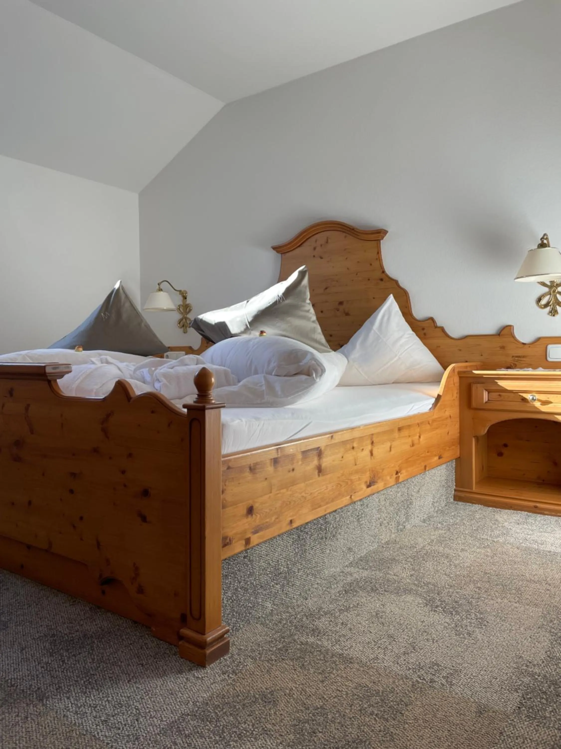 Bed in MONS suites wine passion