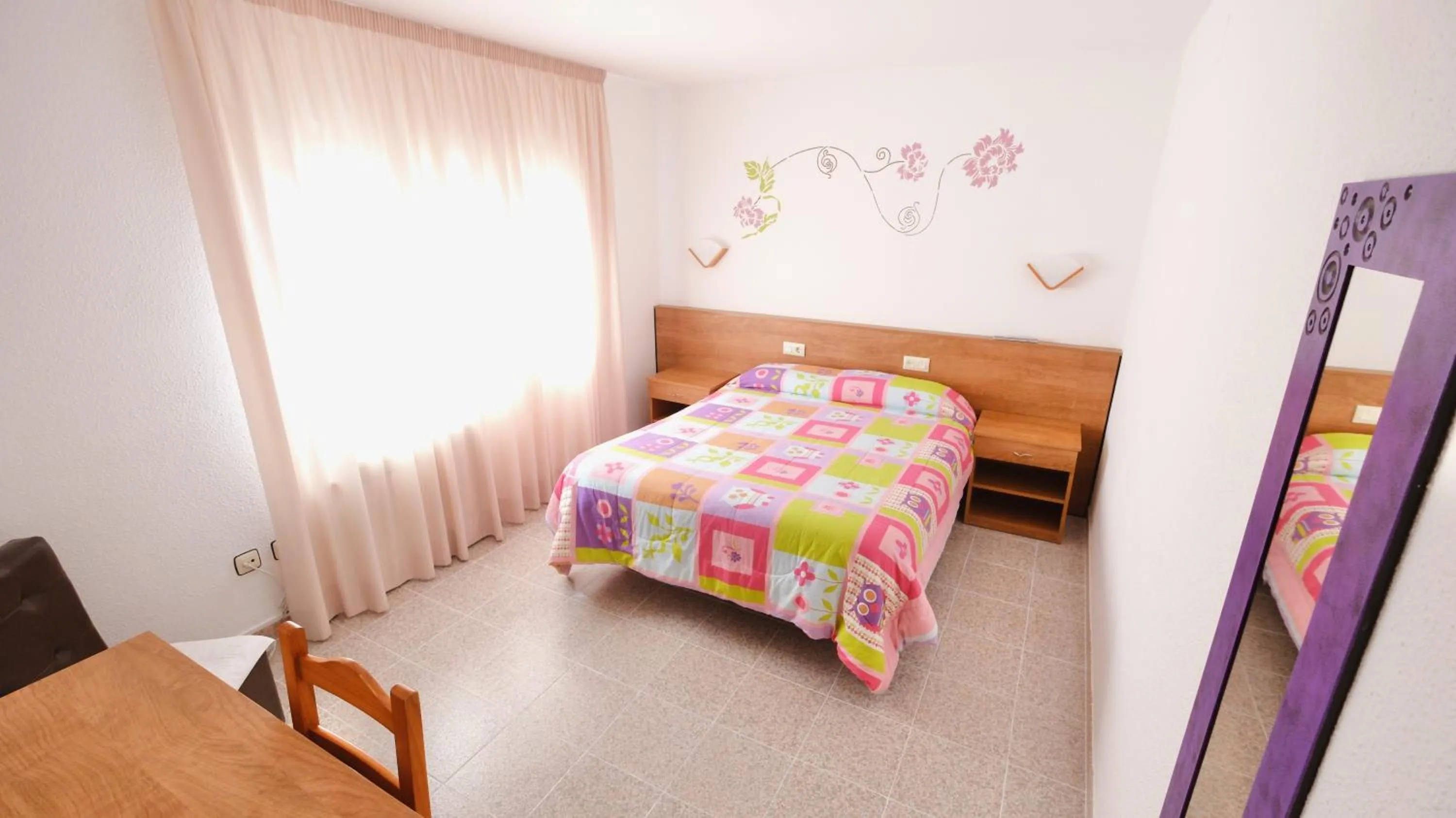 Bed in Hotel Paradís