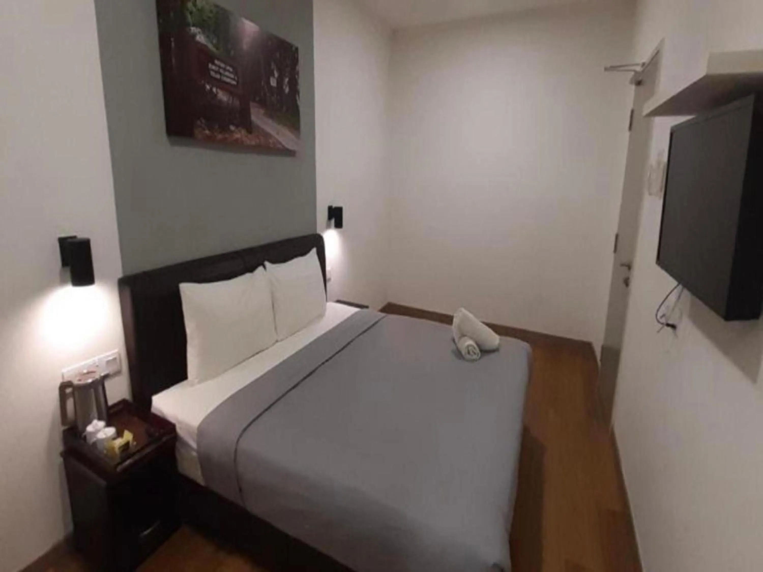 Bedroom in OYO 89492 Carlton Inn Bukit Ubi