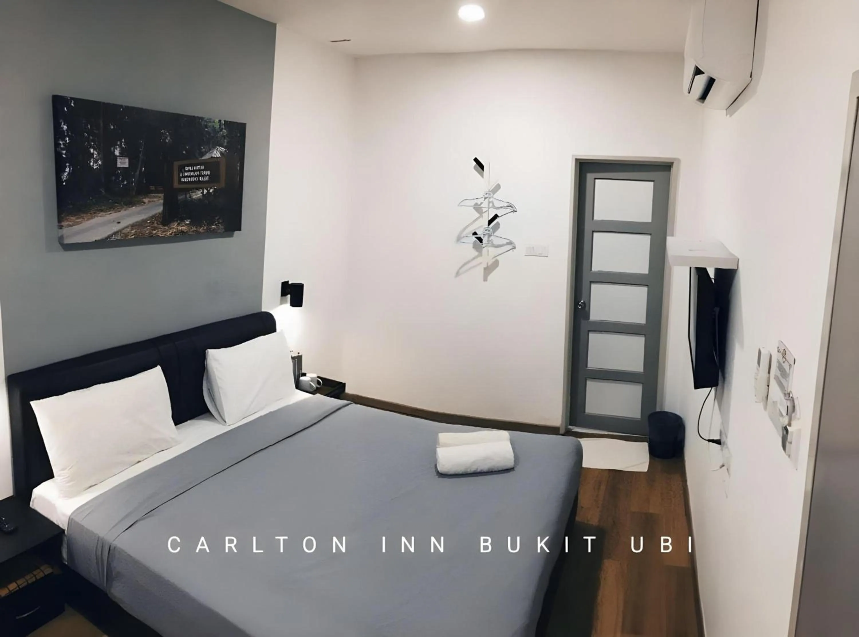 Bedroom in OYO 89492 Carlton Inn Bukit Ubi