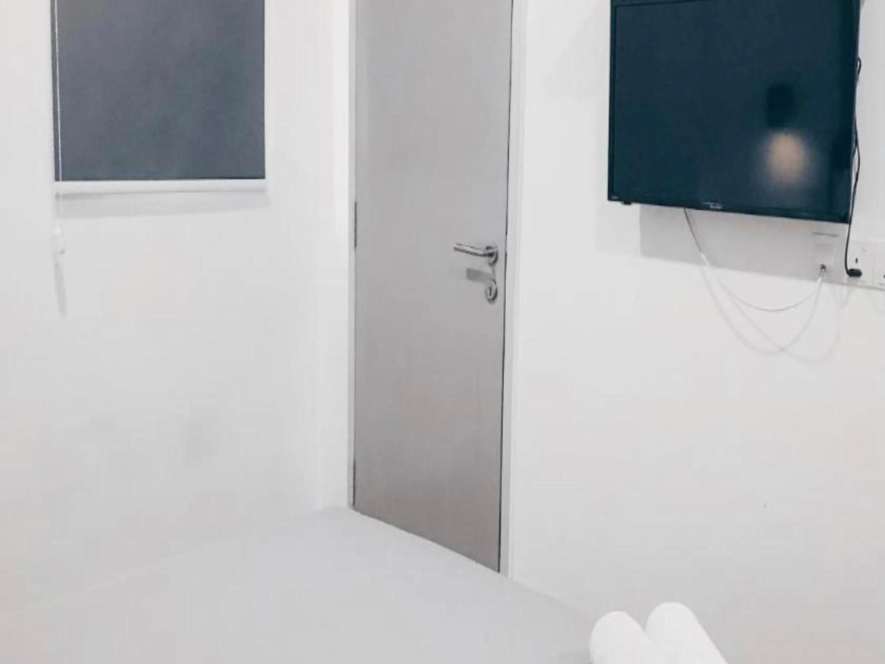 Bedroom in OYO 89492 Carlton Inn Bukit Ubi