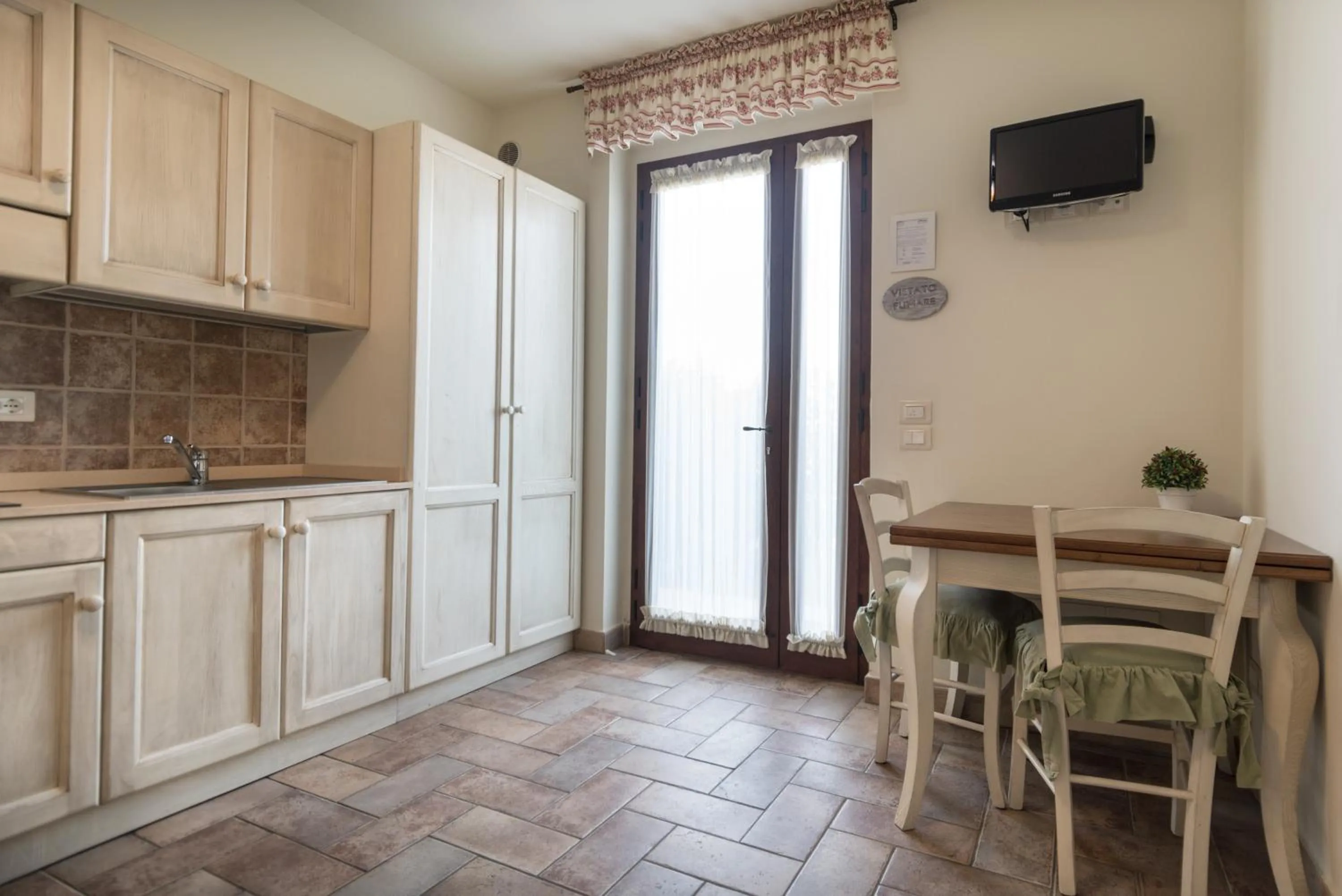 Kitchen or kitchenette in Rosa di Assisi
