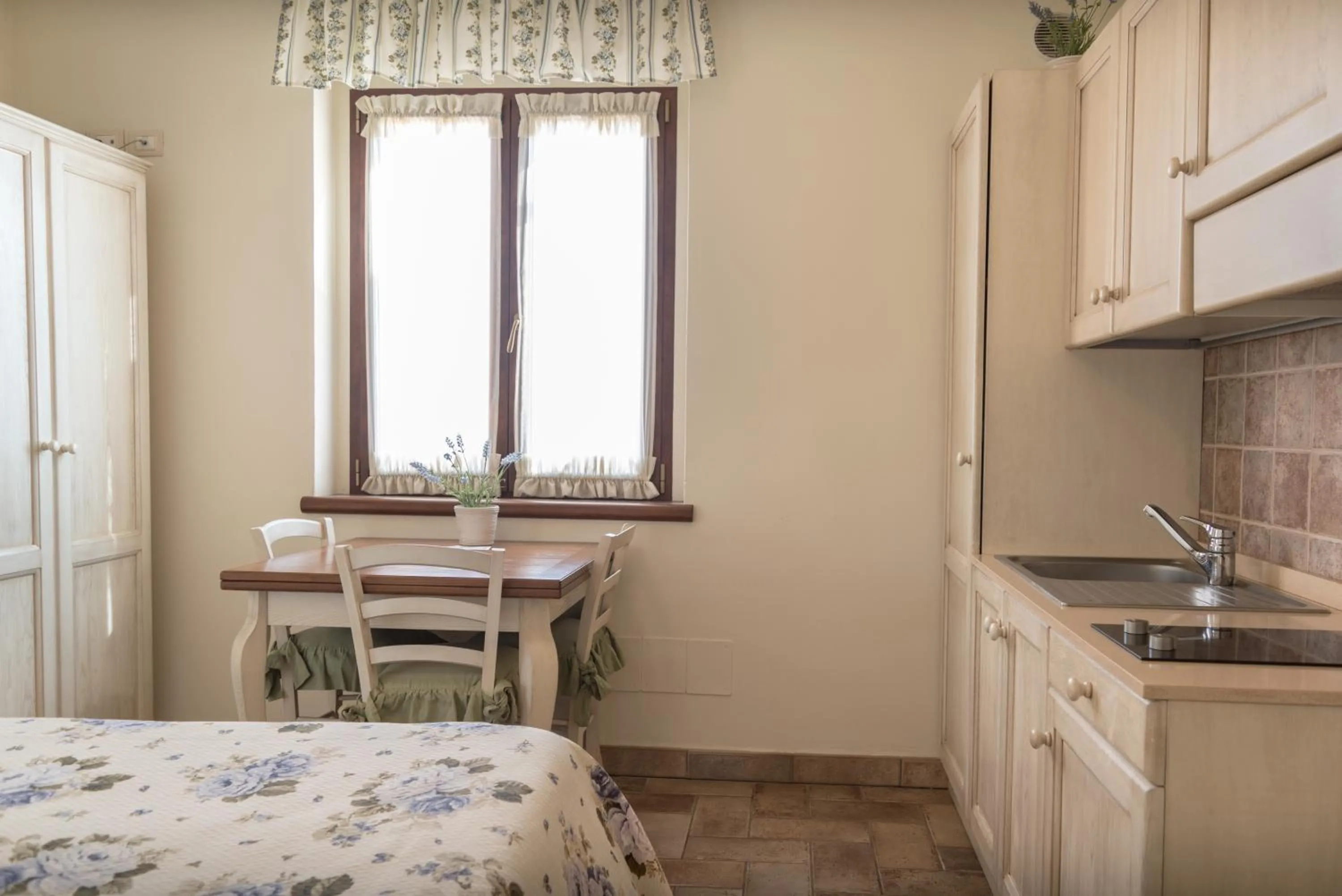 Kitchen or kitchenette in Rosa di Assisi