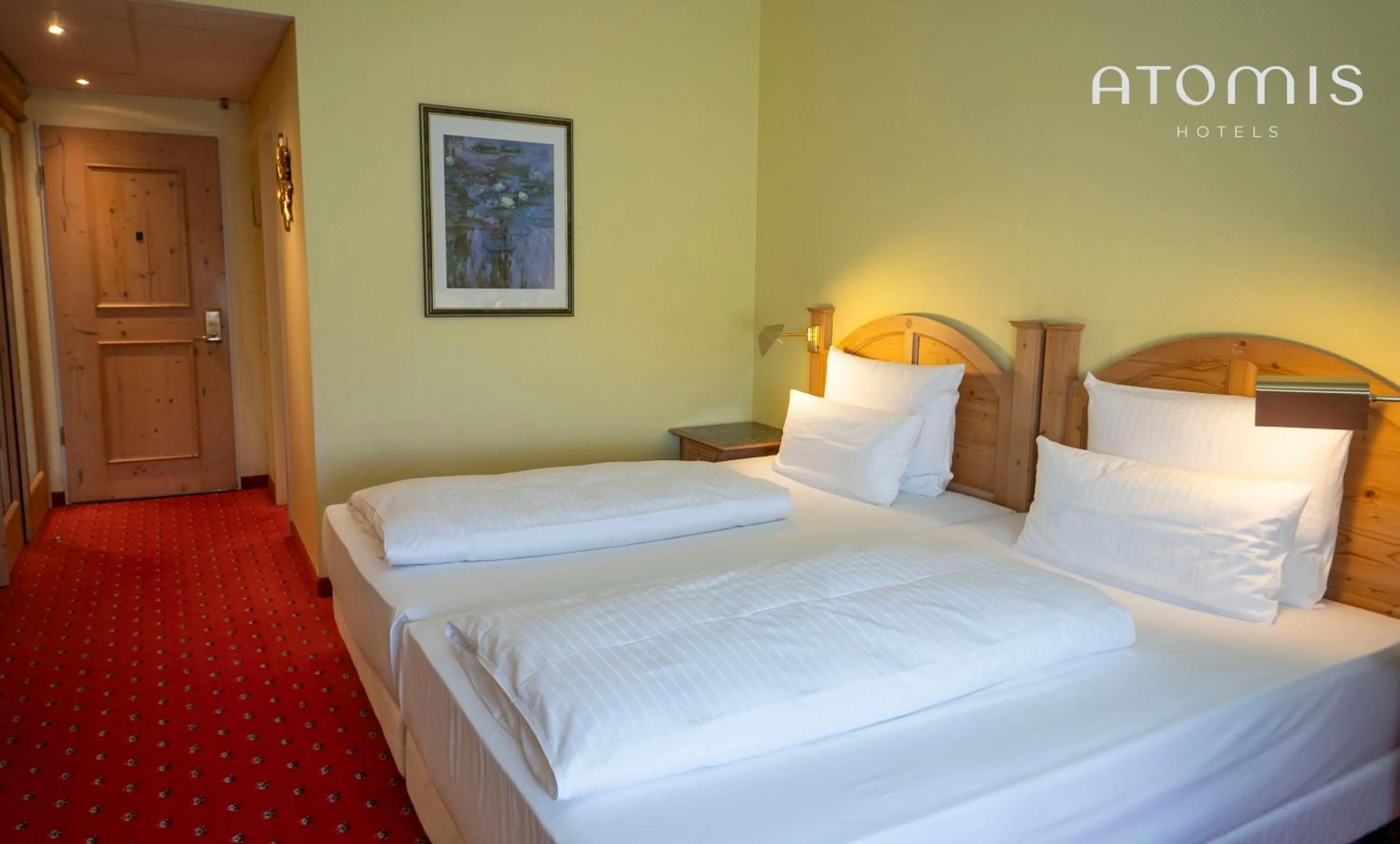 Photo of the whole room, Bed in Atomis Hotel Munich Airport by Mercure