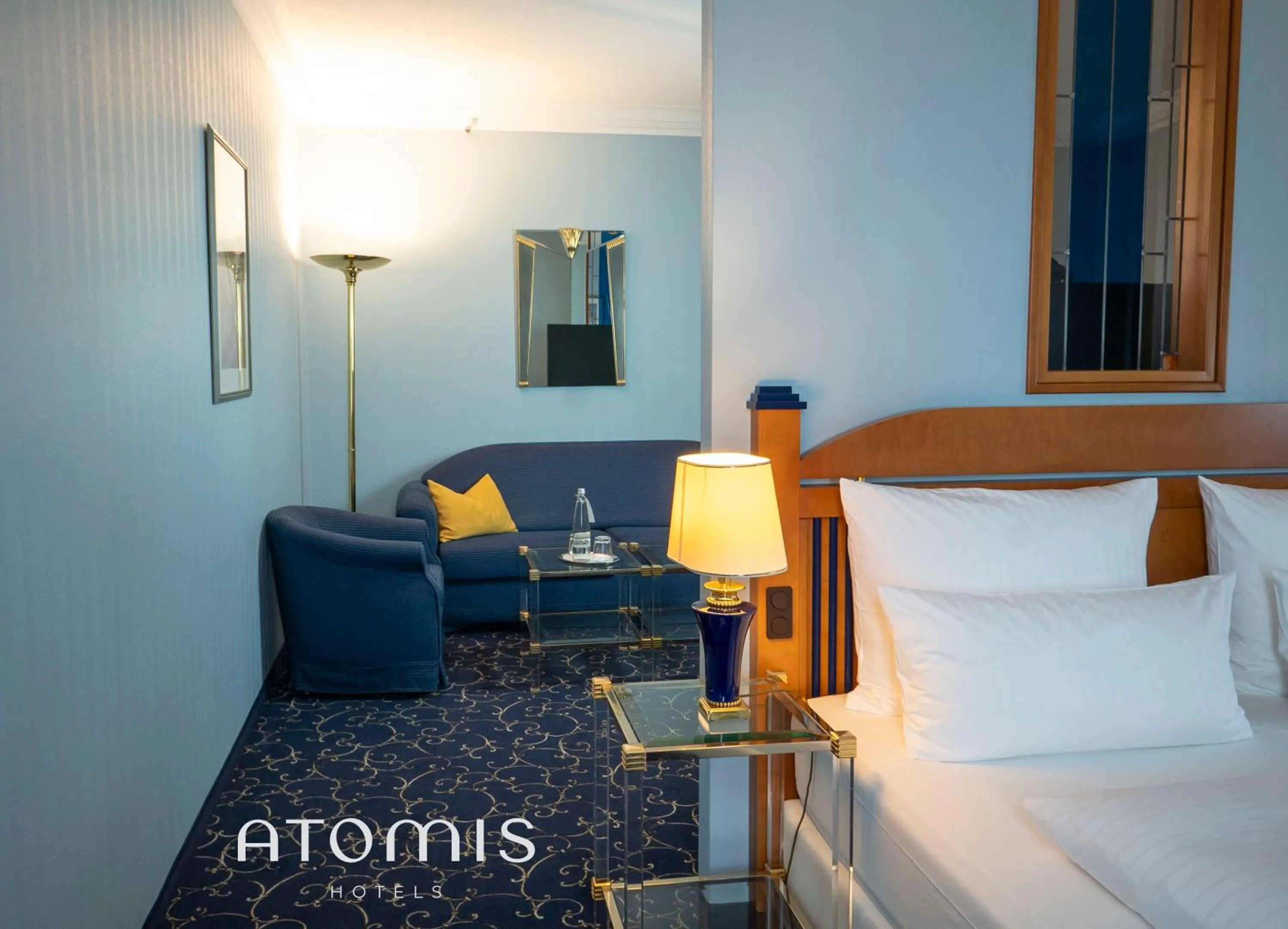 Photo of the whole room, Bed in Atomis Hotel Munich Airport by Mercure