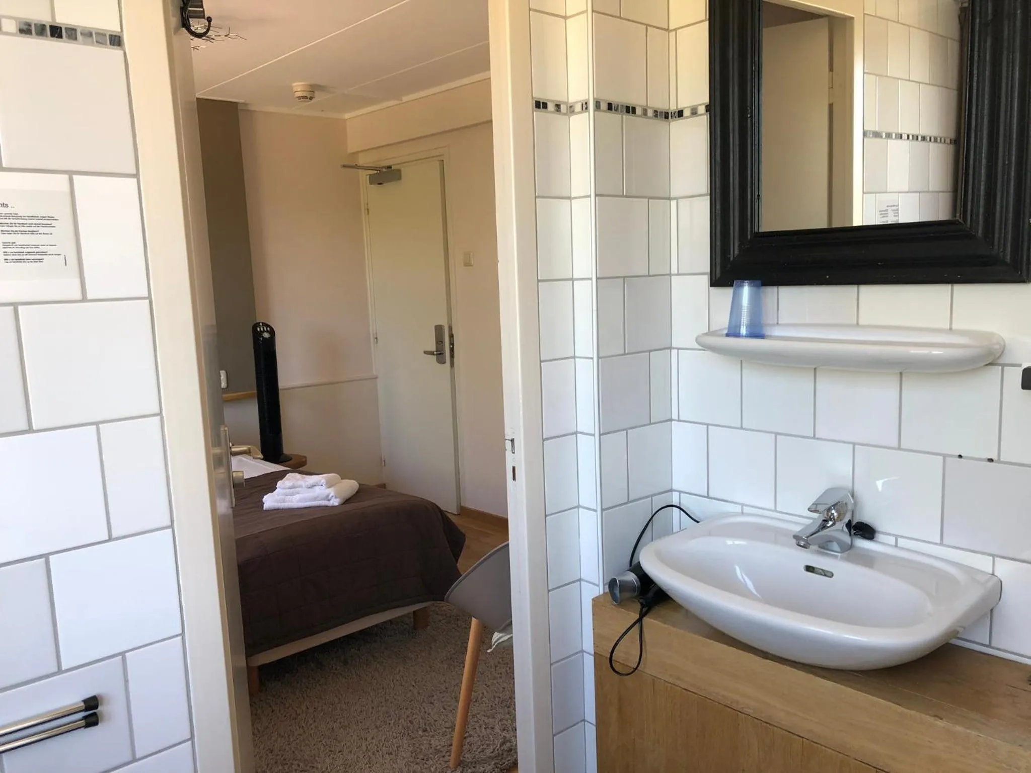 Bathroom in Hotel de Plank - alle kamers met airconditioning