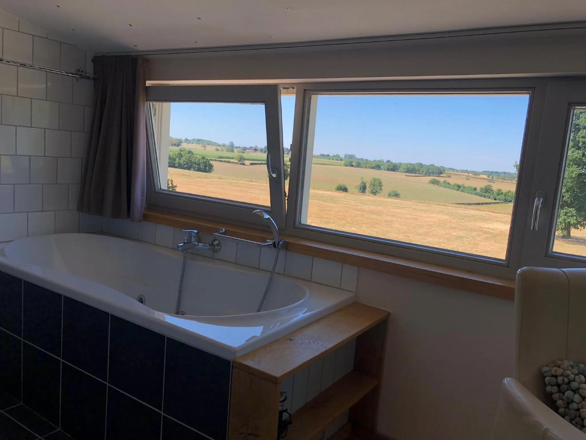 Bathroom in Hotel de Plank - alle kamers met airconditioning