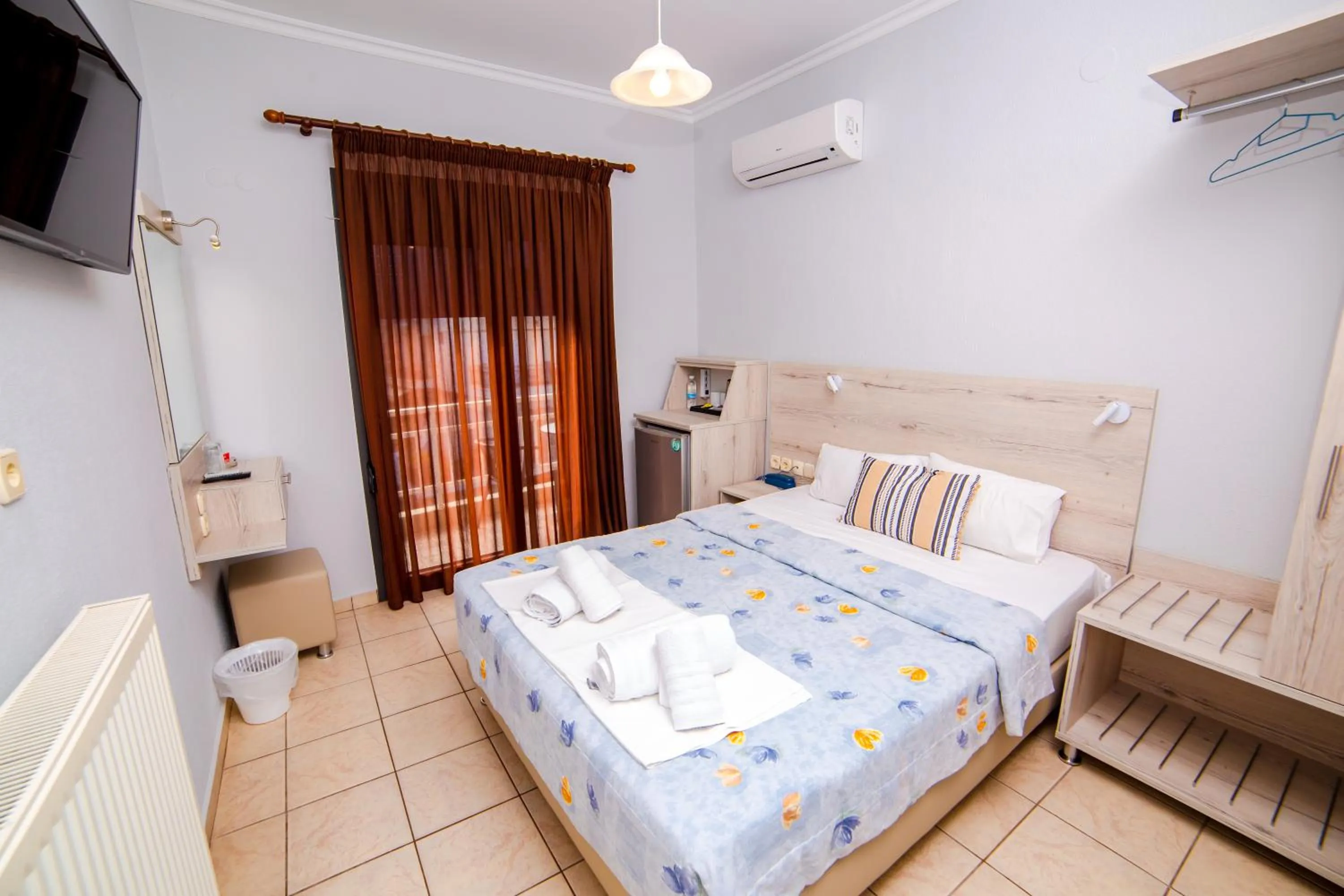 Bed in Hotel Zefyros