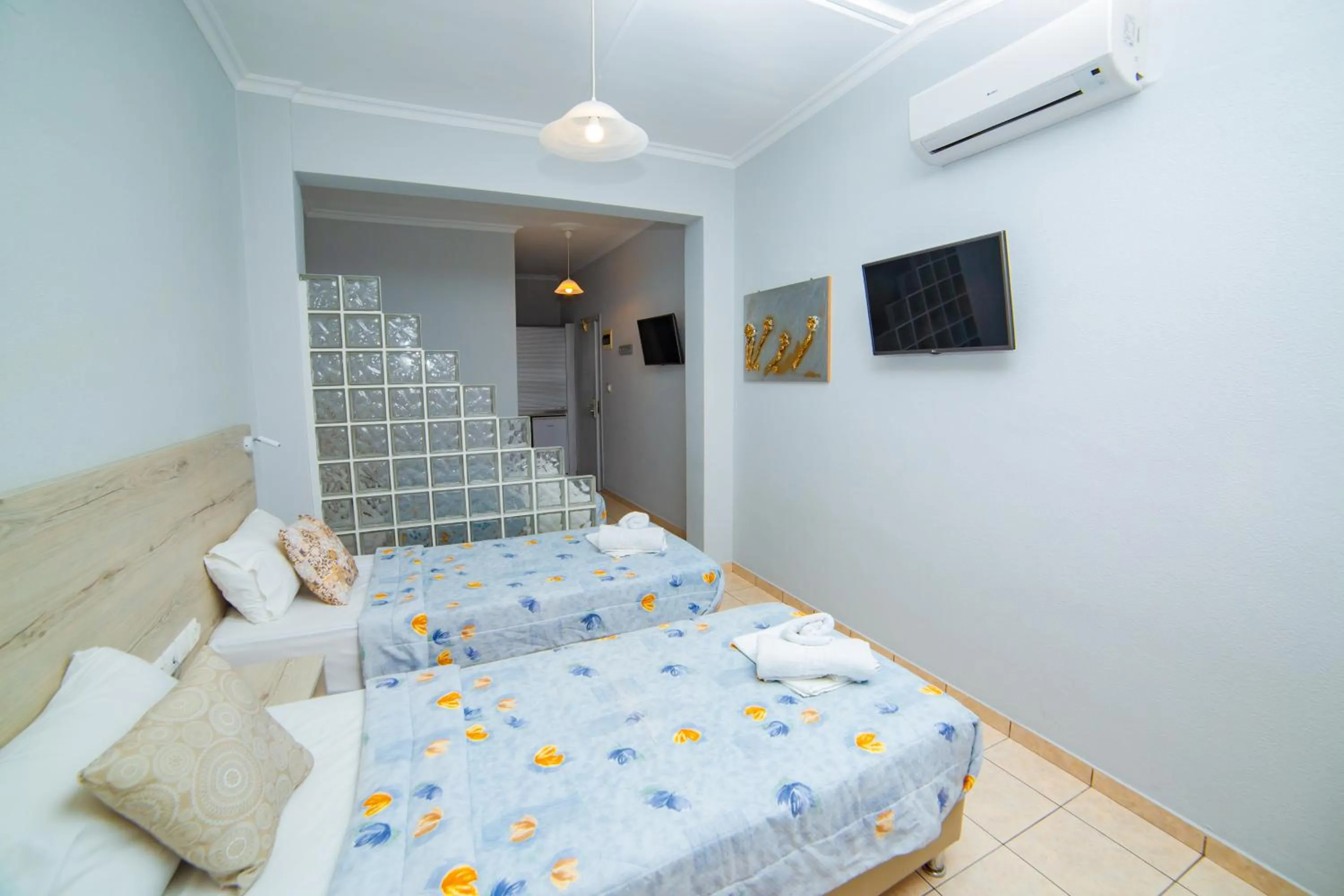 Bed in Hotel Zefyros