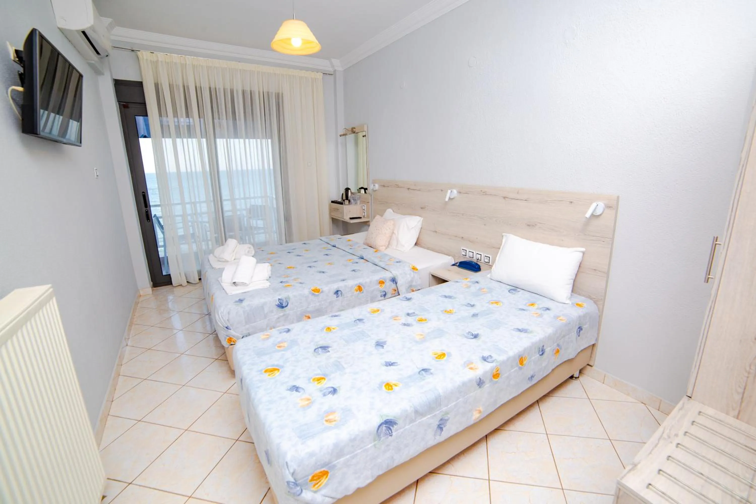 Bed in Hotel Zefyros