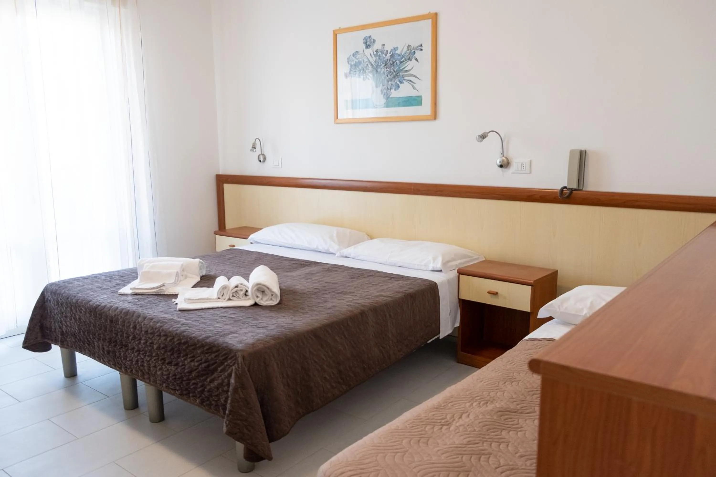 Bed in Hotel Esperia