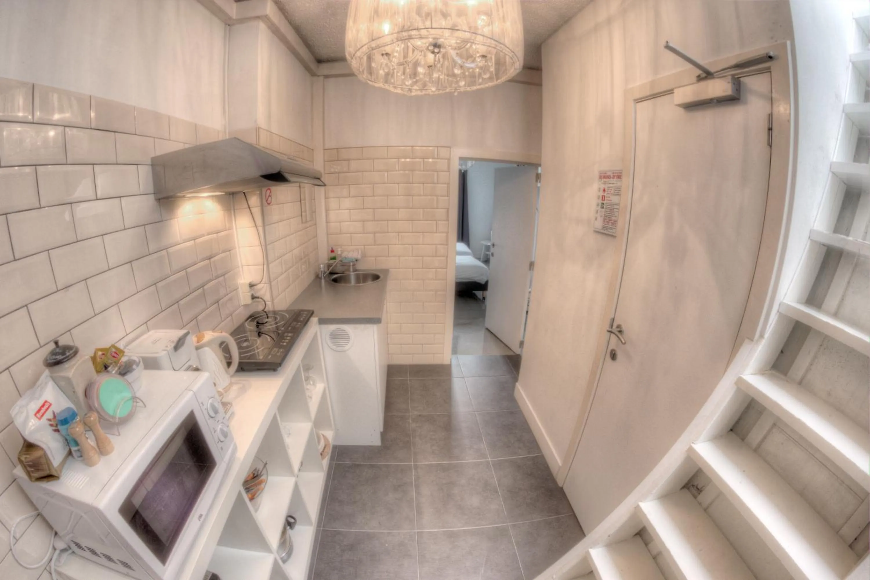 Kitchen or kitchenette in Hotel Urban Dreams